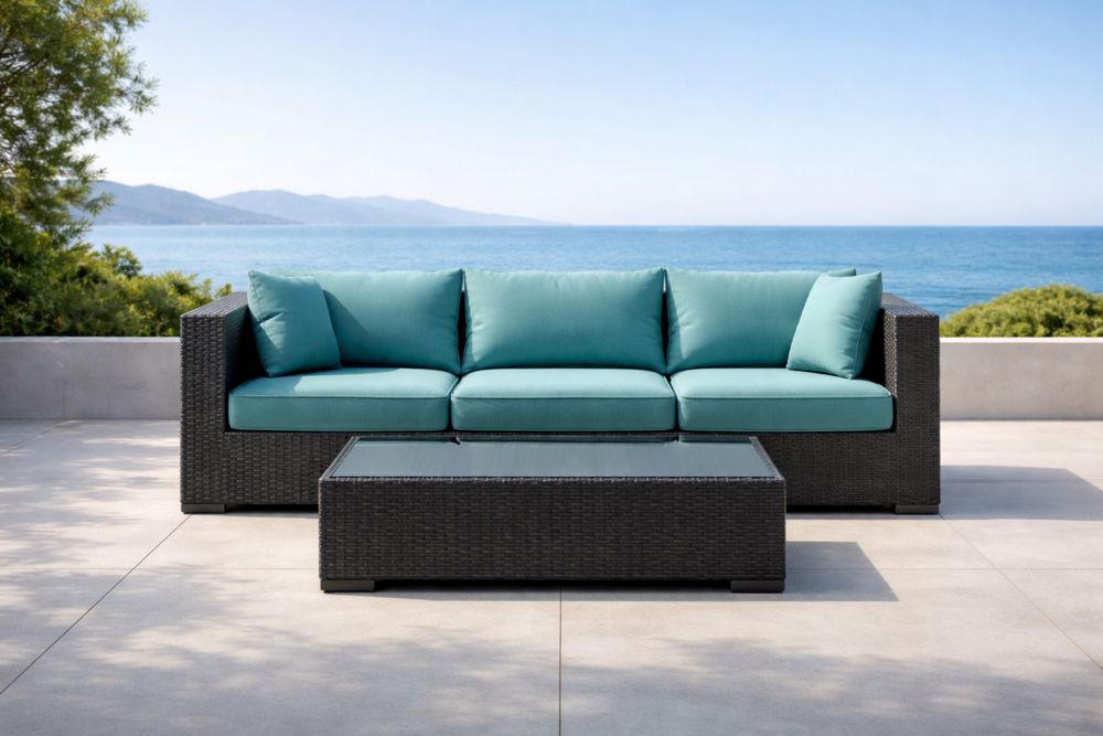Canapé d'extérieur en résine tressée coussins turquoise