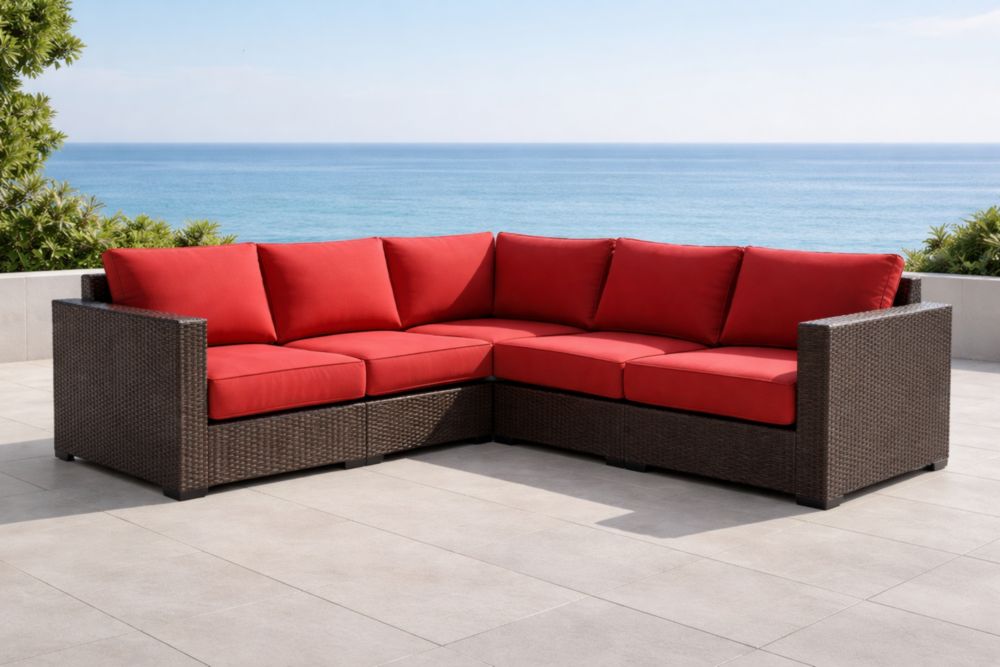 Canapé d'angle extérieur 5 places résine tressée coussins rouges