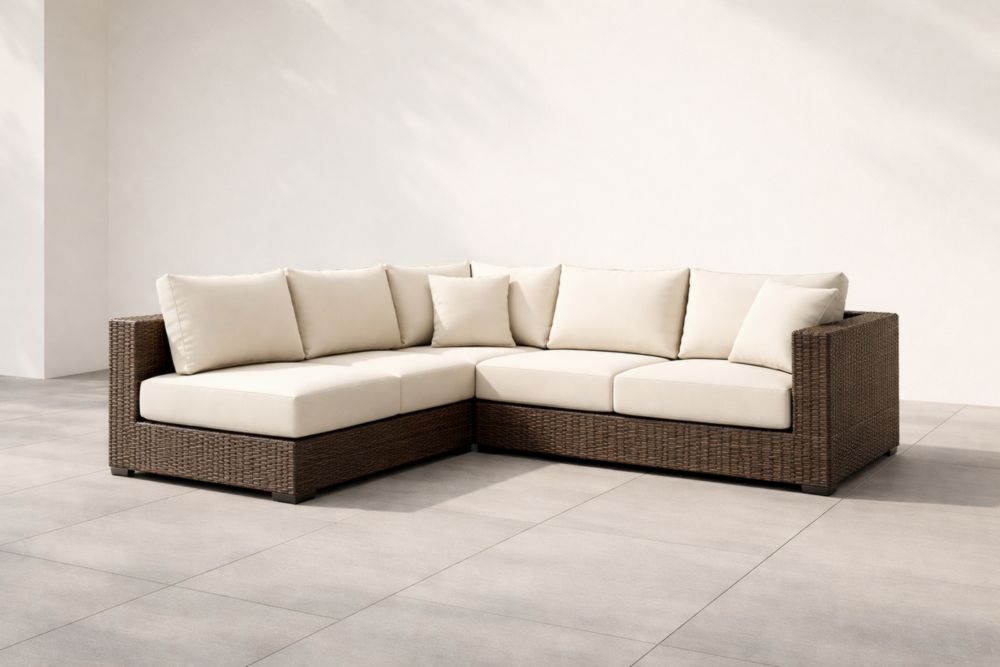 Canapé d'angle extérieur en résine tressée avec coussins crème