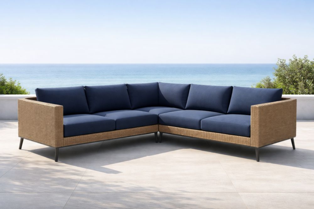 Canapé d'angle extérieur en résine tressée avec coussins en tissu bleu