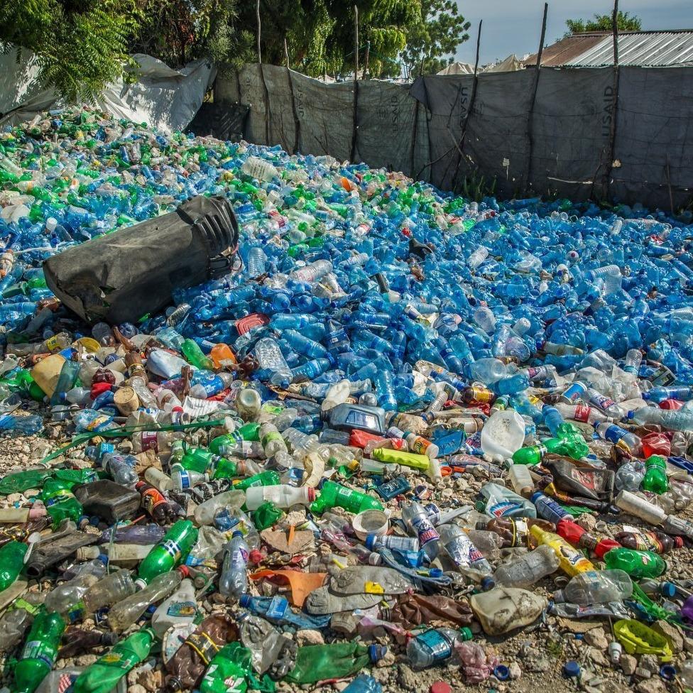 Recycled Plastic Water Bottles And Trash Can in Haiti Port Au Prince