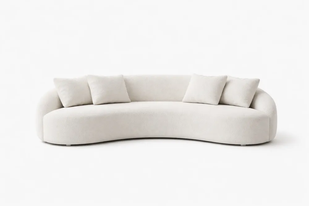 Canapé courbe en tissu polyester blanc avec quatre coussins
