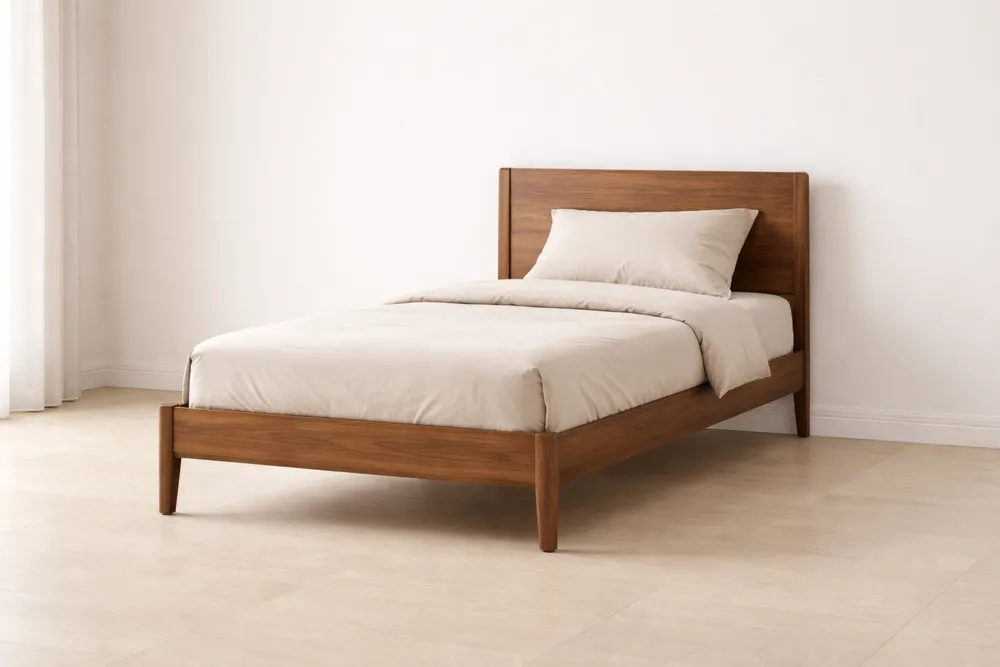 Lit simple en bois noyer avec matelas et oreiller