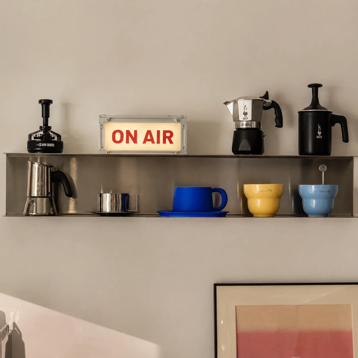 ON AIR light styled on a shelf