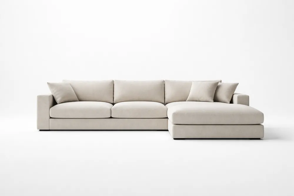 Canapé d'angle en tissu beige avec coussins
