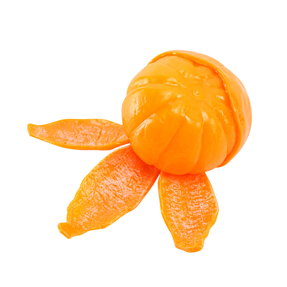 皮をむいたバナナを握るおもちゃ