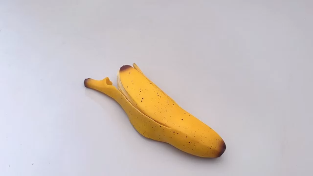 皮をむいたバナナを握るおもちゃ