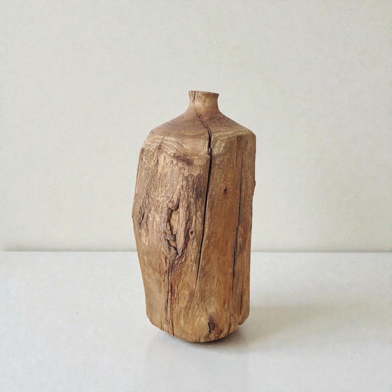 Handmade rustic wooden vase, wabi-sabi style, suitable for solid wood shelf decoration.