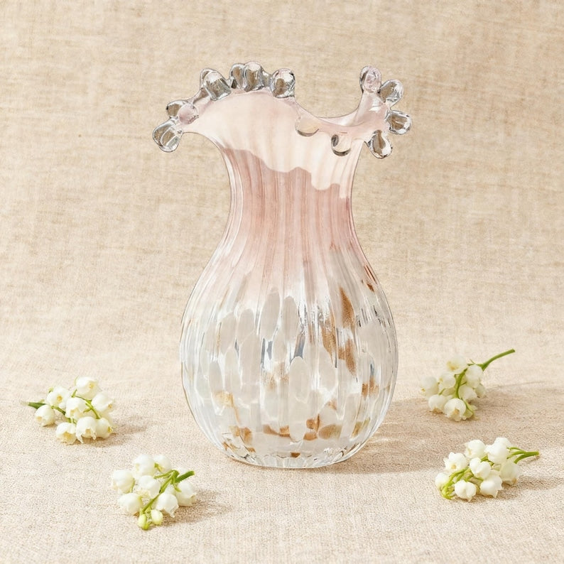 Elegant glass vase with ceramic flowers, home decor