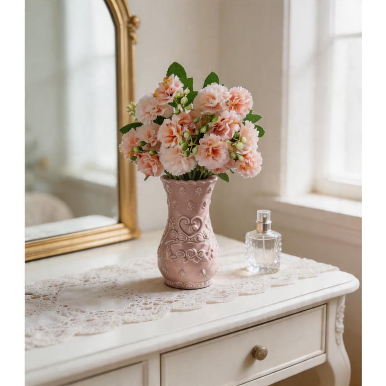 Pink ceramic Porcelain vase with embossed heart pattern and ruffled rim.