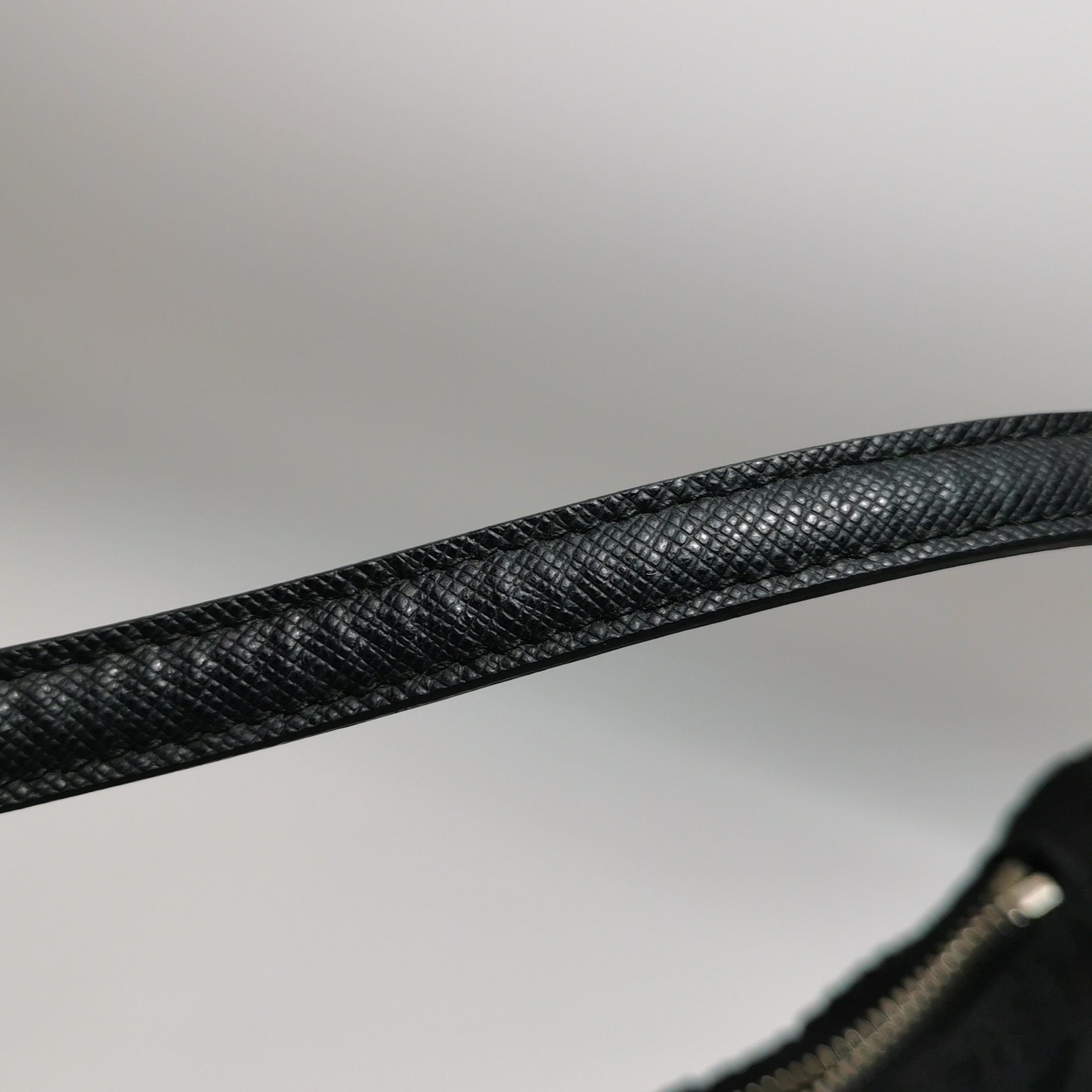 Prada Re-Edition Hobo Saffiano Leather Mini — photo 24 of 24