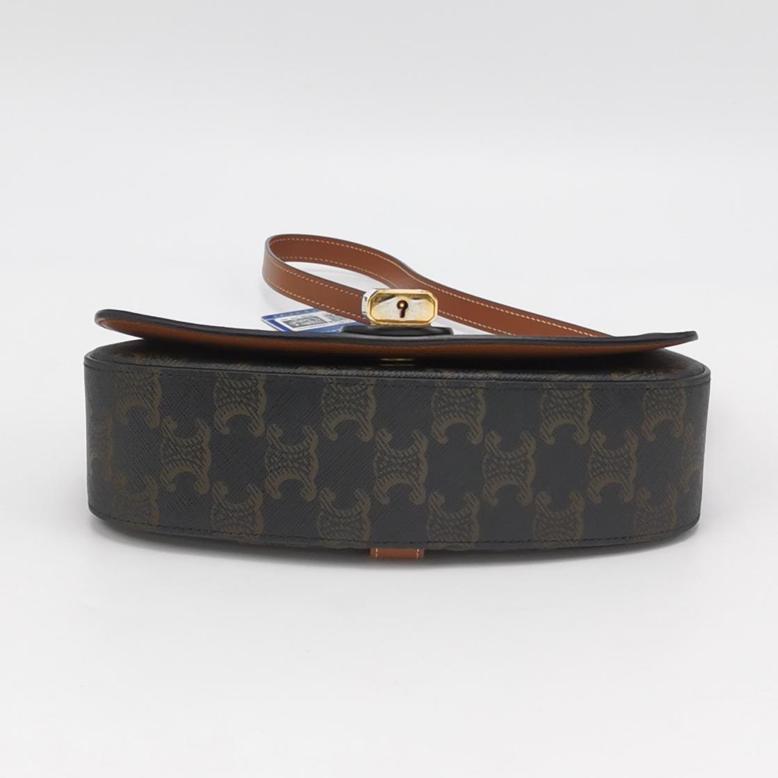 Celine Tabou Clutch with Strap Triomphe Coated Canvas — photo 5 of 11