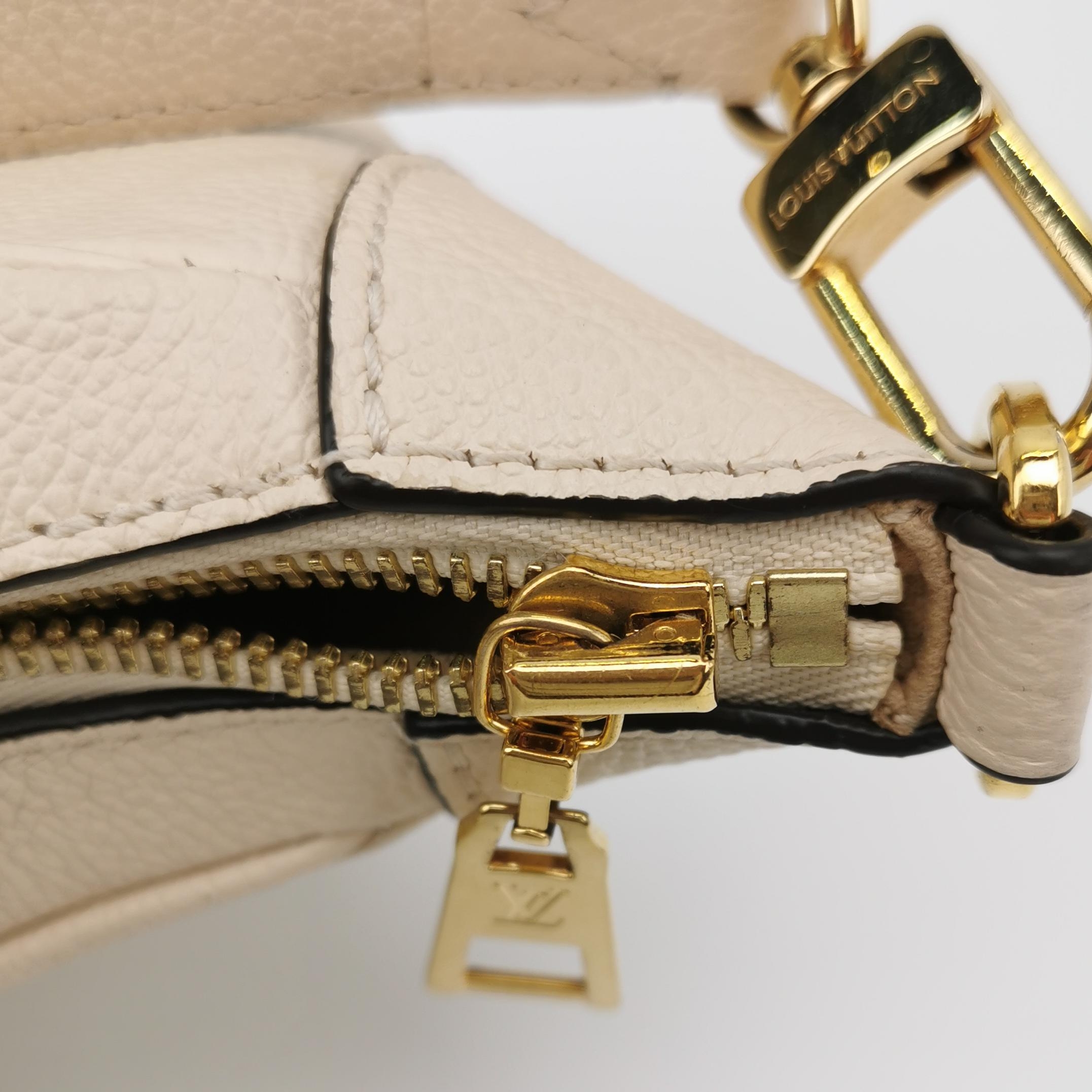 Louis Vuitton(LV) Bagatelle NM Handbag Monogram Empreinte Giant — photo 11 of 11