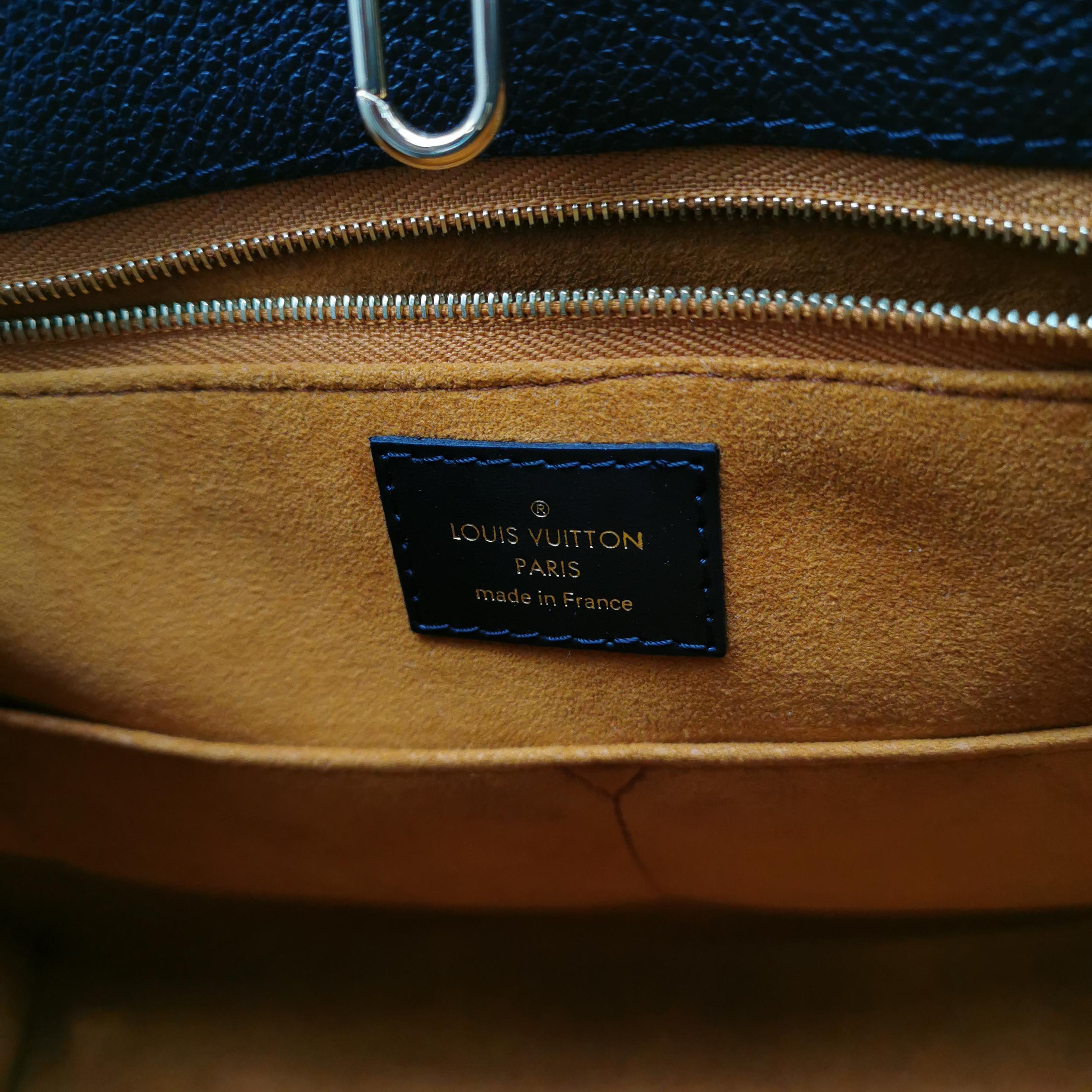 Louis Vuitton(LV) OnTheGo Tote Monogram Empreinte Giant MM — photo 8 of 15