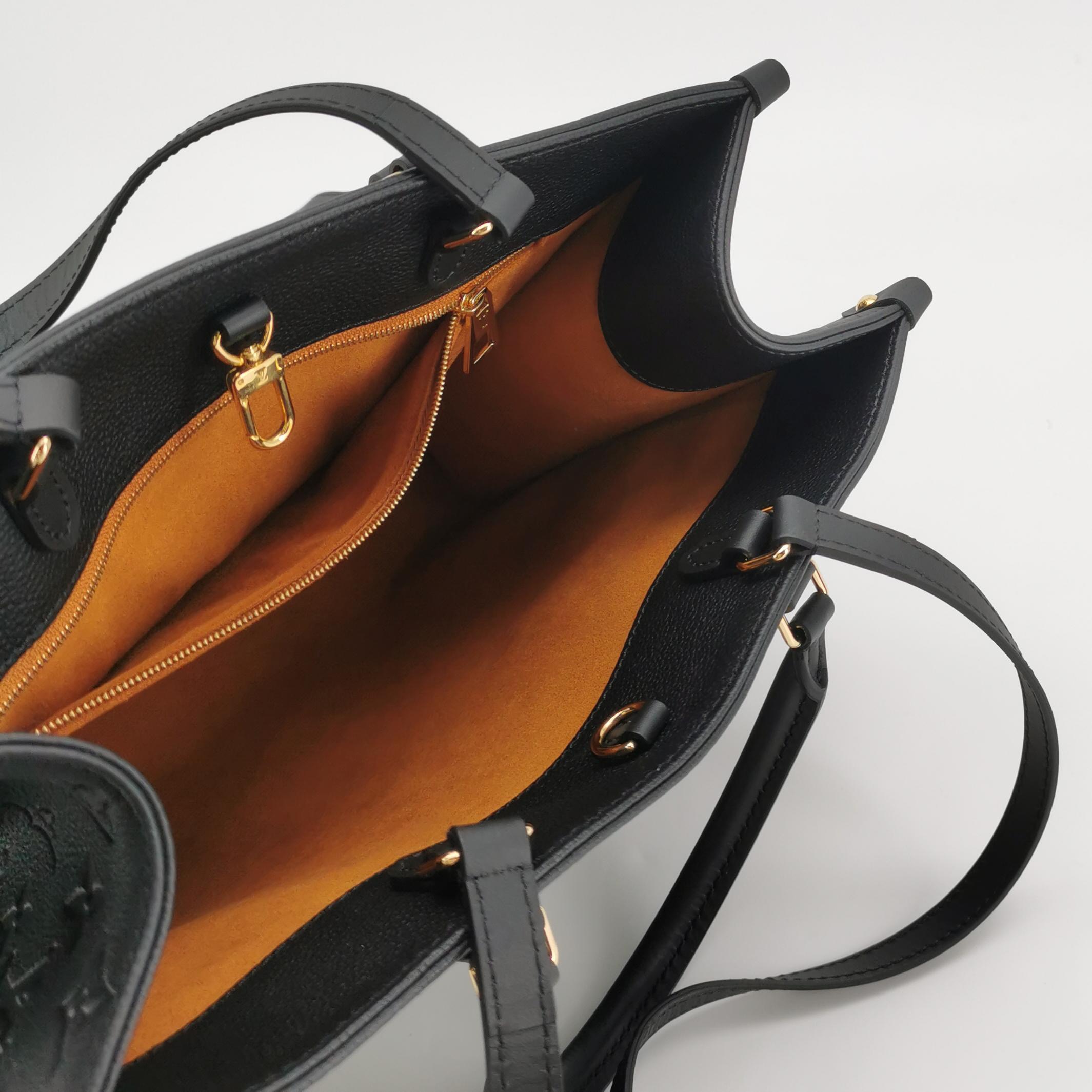 Louis Vuitton(LV) OnTheGo Tote Monogram Empreinte Giant MM — photo 7 of 13