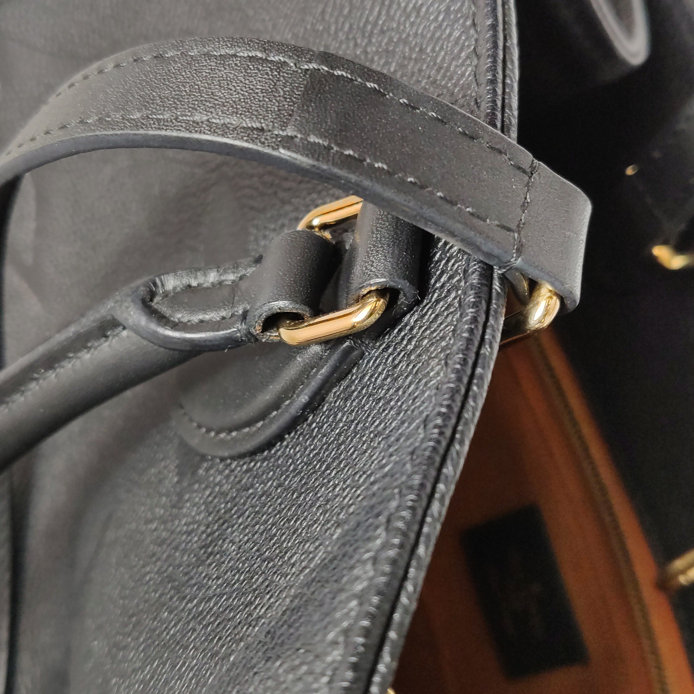 Louis Vuitton(LV) OnTheGo Tote Monogram Empreinte Giant MM — photo 11 of 15