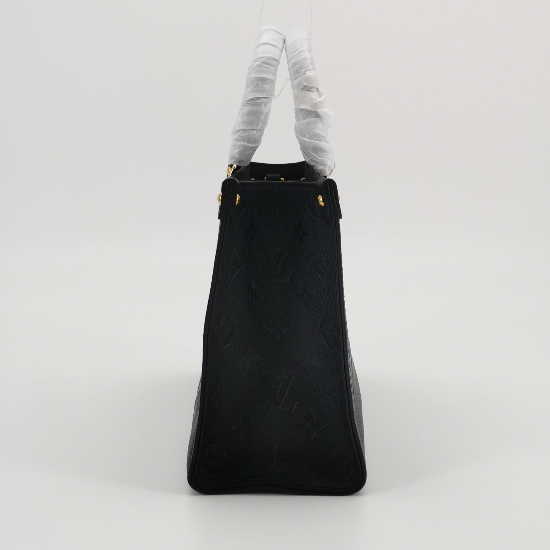Louis Vuitton(LV) OnTheGo Tote Monogram Empreinte Giant PM — photo 4 of 14