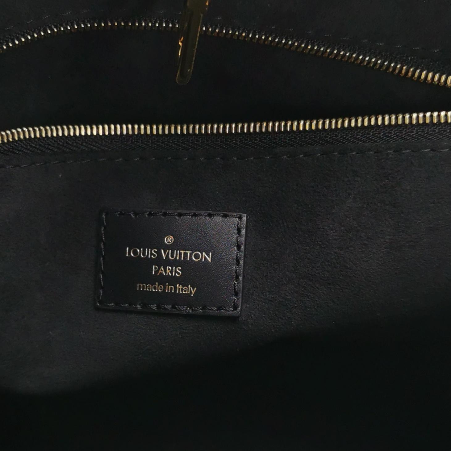 Louis Vuitton(LV) OnTheGo Tote Monogram Empreinte Giant PM — photo 8 of 14
