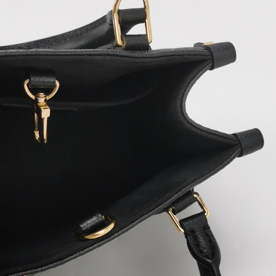 Louis Vuitton(LV) OnTheGo Tote Monogram Empreinte Giant BB — photo 7 of 15