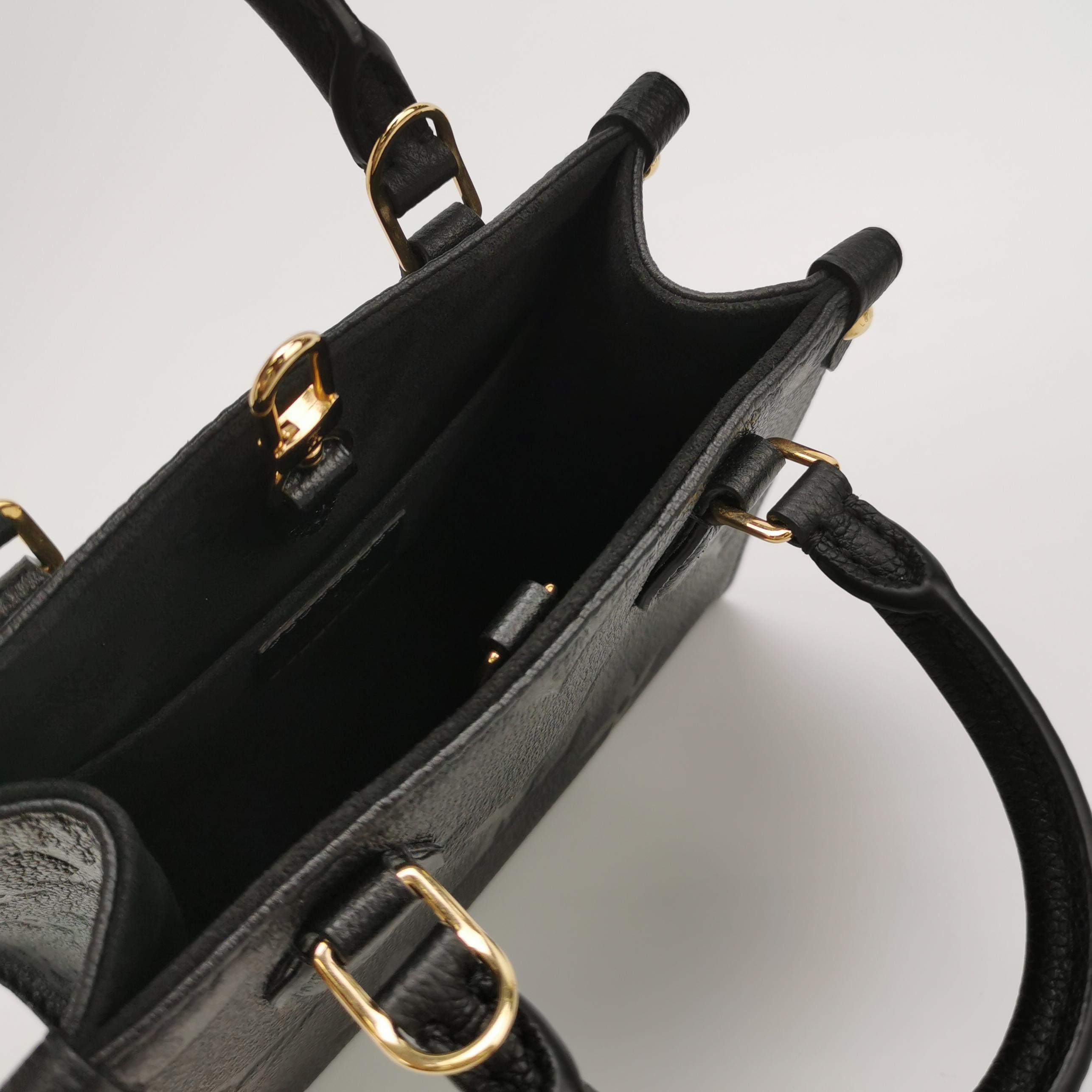 Louis Vuitton(LV) OnTheGo Tote Monogram Empreinte Giant BB — photo 7 of 13