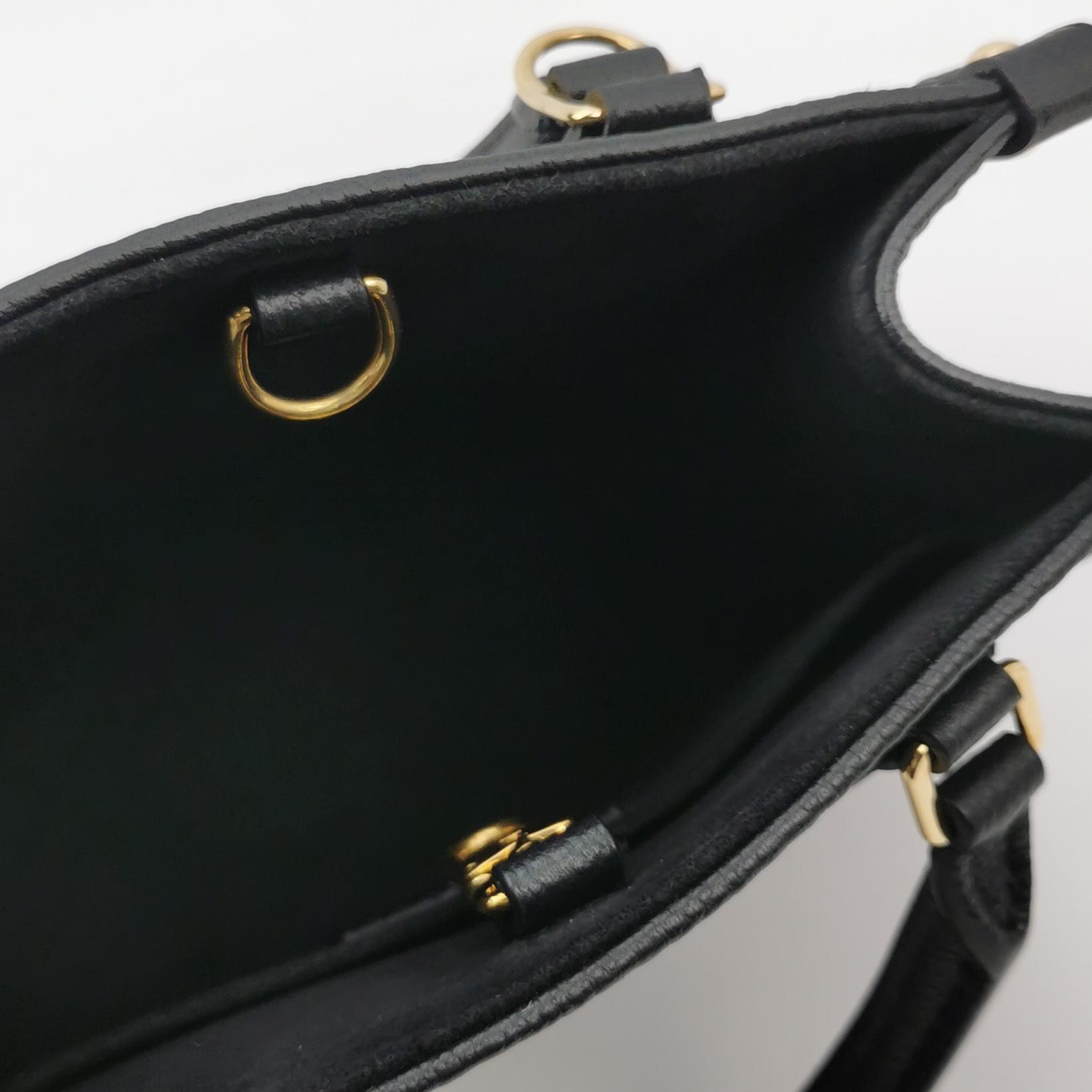 Louis Vuitton(LV) OnTheGo Tote Monogram Empreinte Giant BB — photo 7 of 15