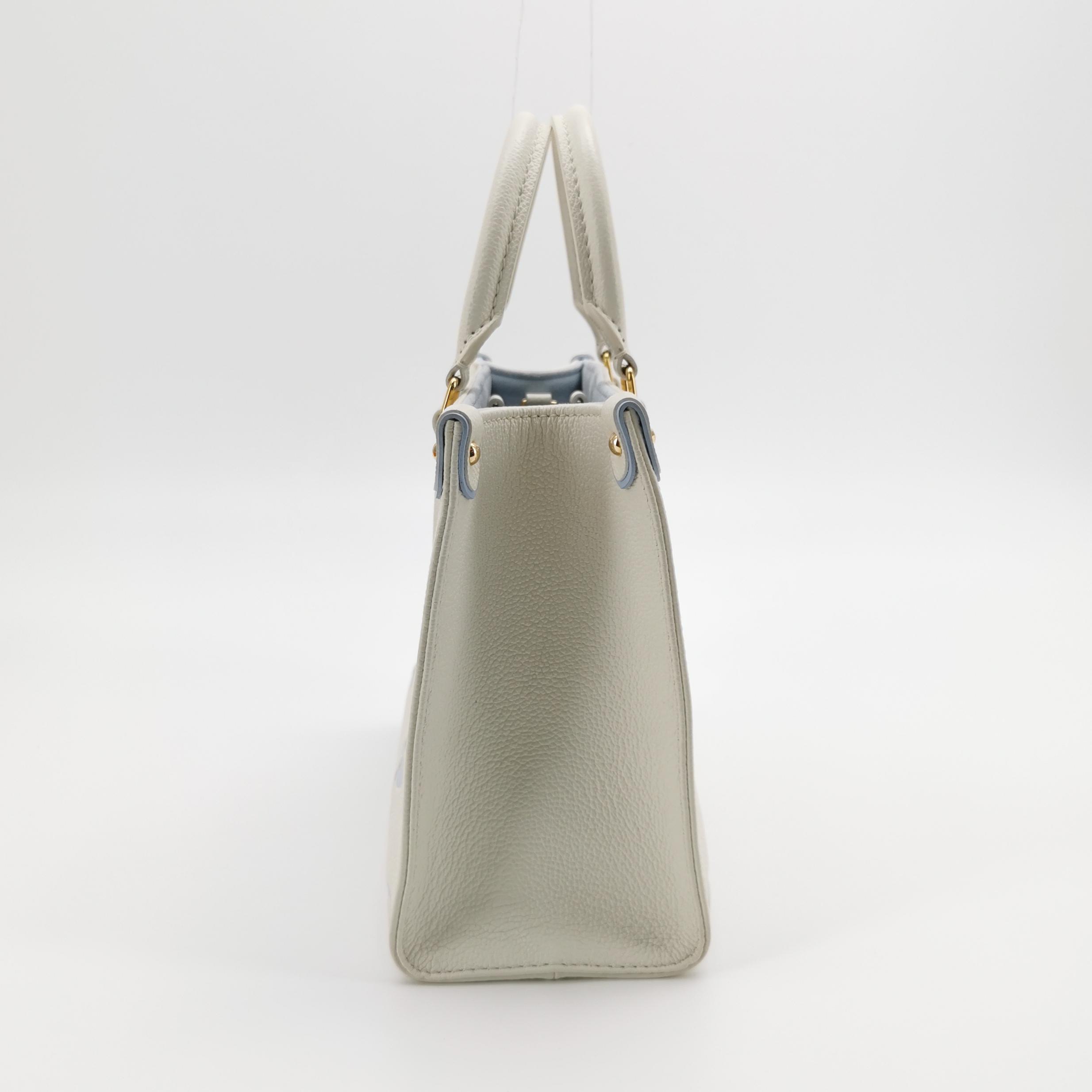 Louis Vuitton(LV) OnTheGo Tote Bicolor Monogram Empreinte Giant PM — photo 5 of 16