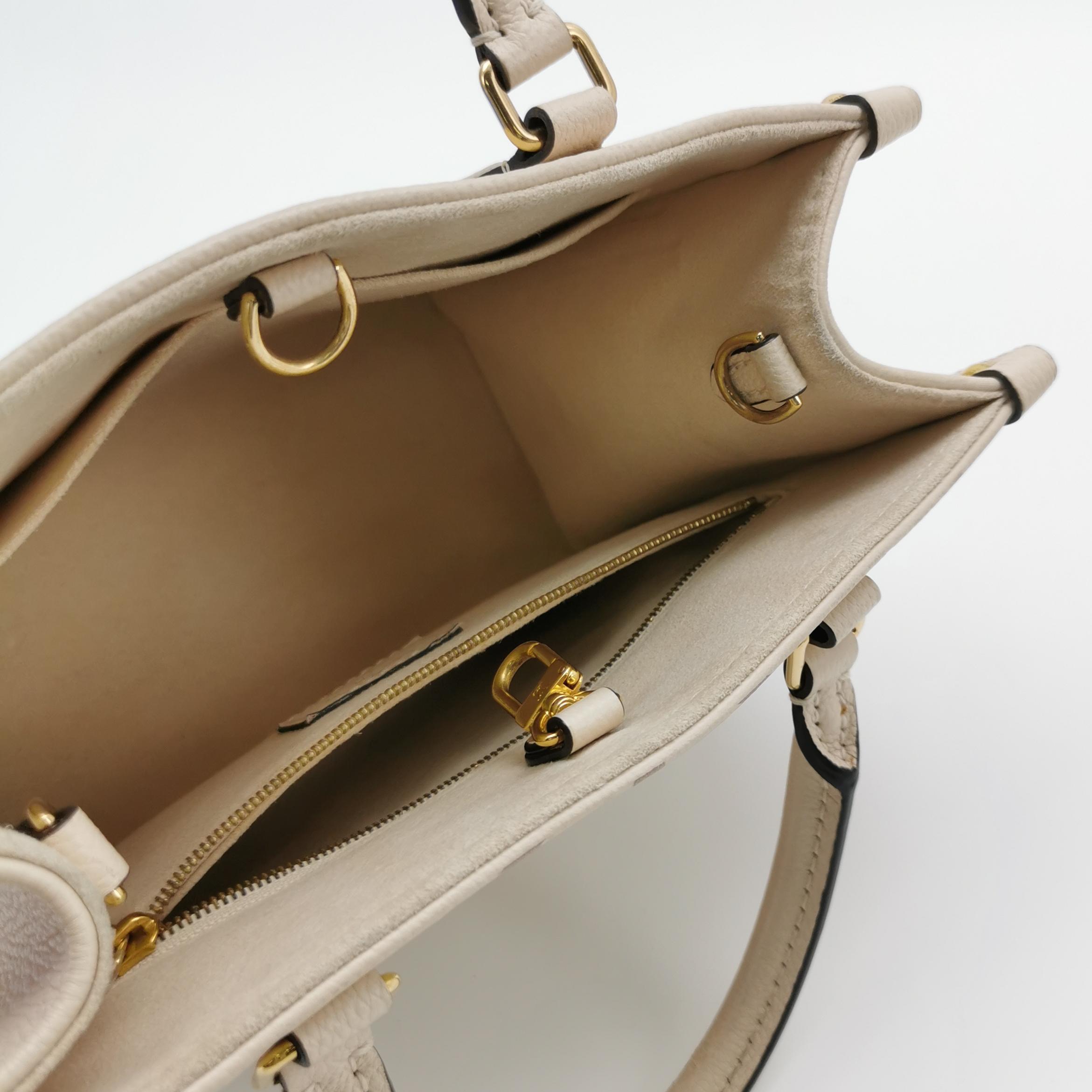 Louis Vuitton(LV) OnTheGo Tote Bicolor Monogram Empreinte Giant PM — photo 7 of 17