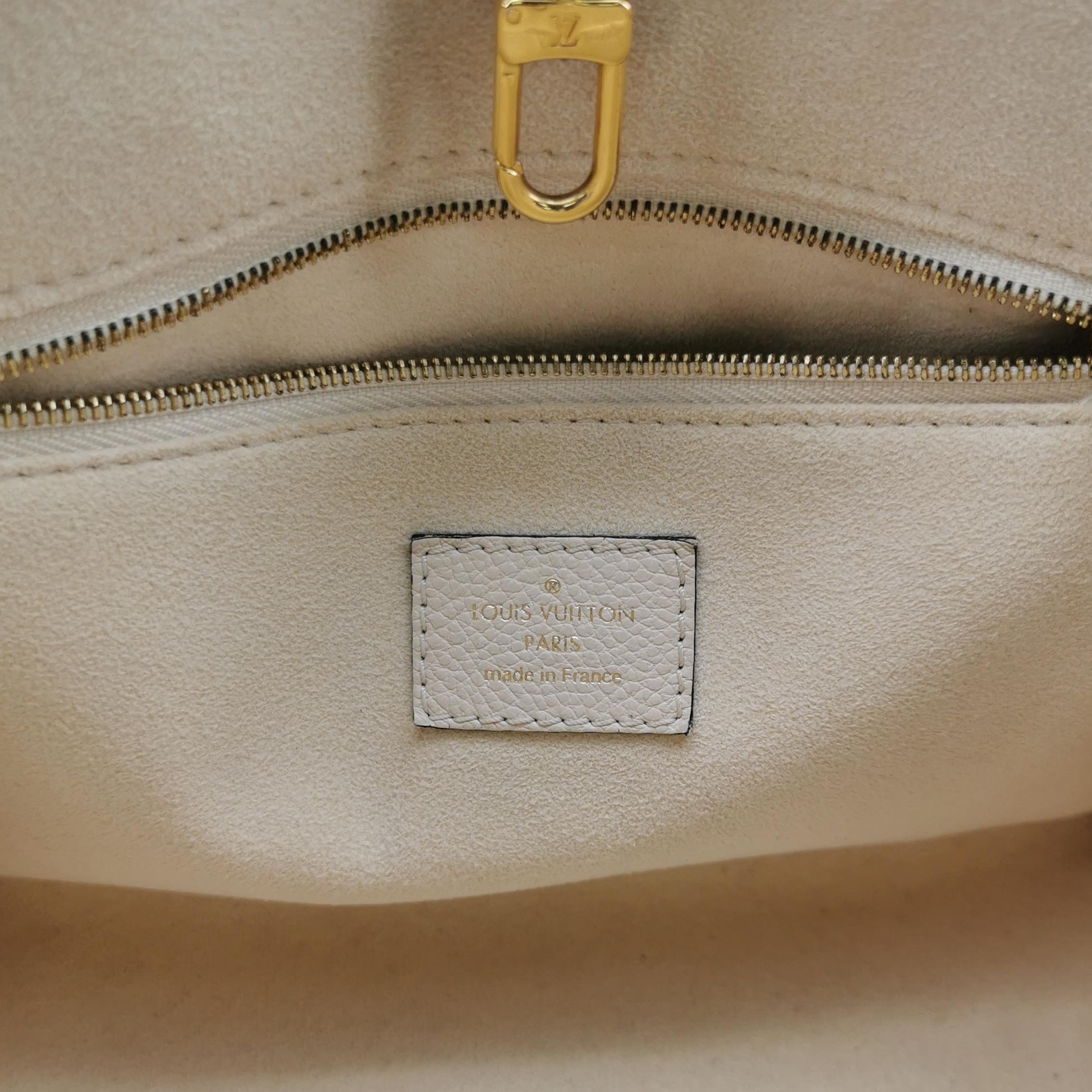 Louis Vuitton(LV) OnTheGo Tote Bicolor Monogram Empreinte Giant PM — photo 8 of 17
