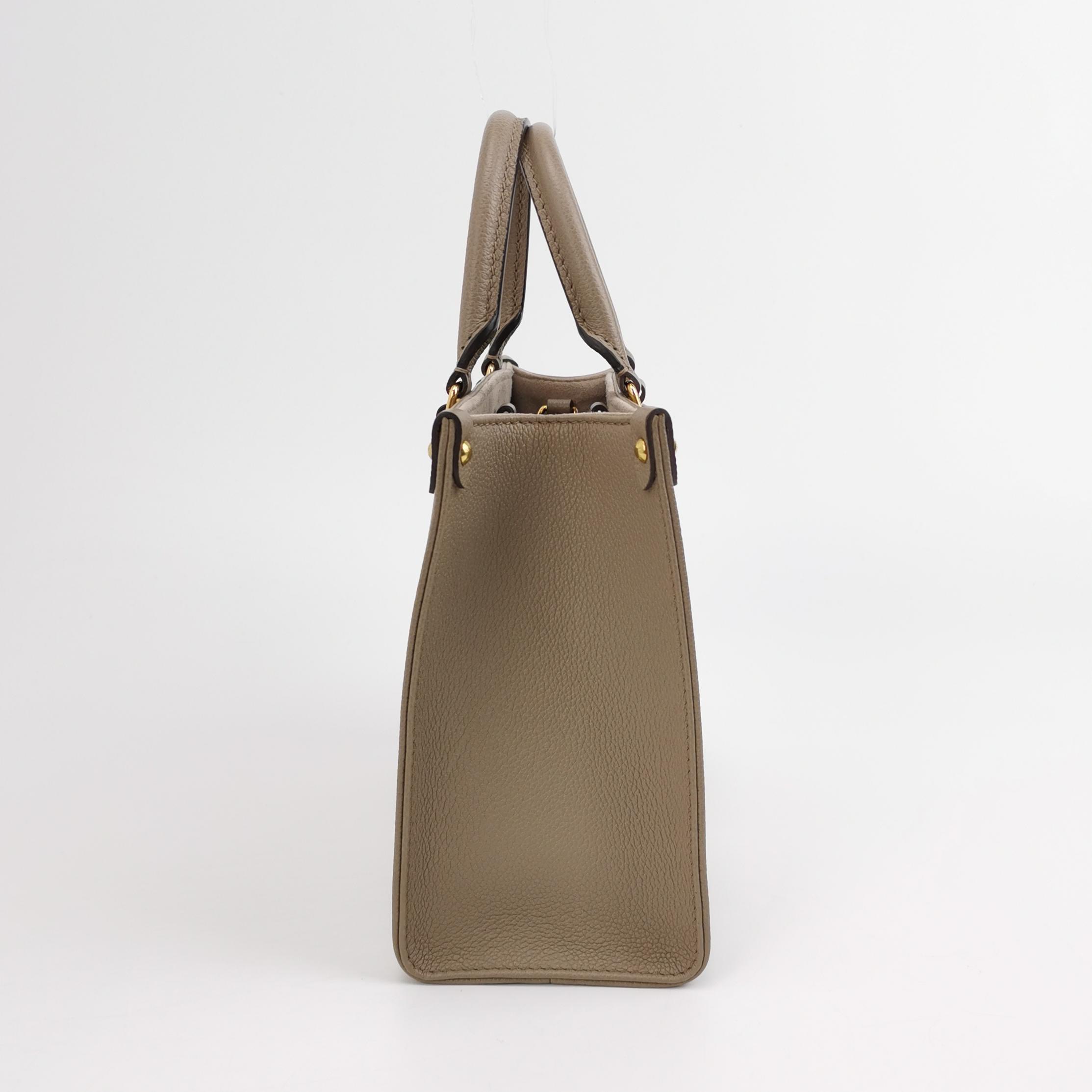Louis Vuitton(LV) OnTheGo Tote Bicolor Monogram Empreinte Giant PM — photo 4 of 14