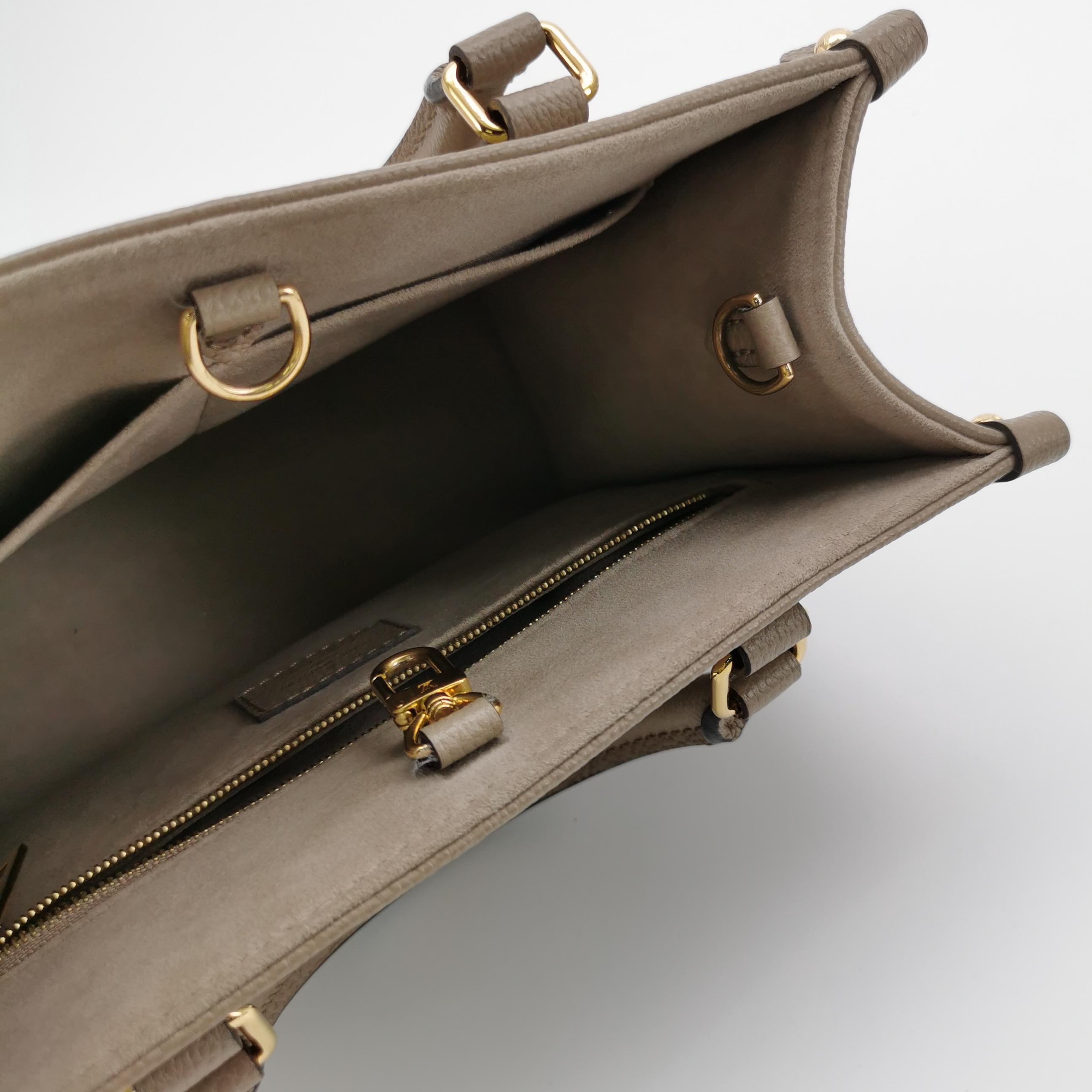 Louis Vuitton(LV) OnTheGo Tote Bicolor Monogram Empreinte Giant PM — photo 7 of 14