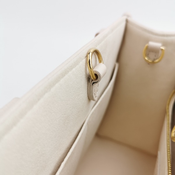 Louis Vuitton(LV) OnTheGo Tote By The Pool Monogram Empreinte Giant PM — photo 8 of 10