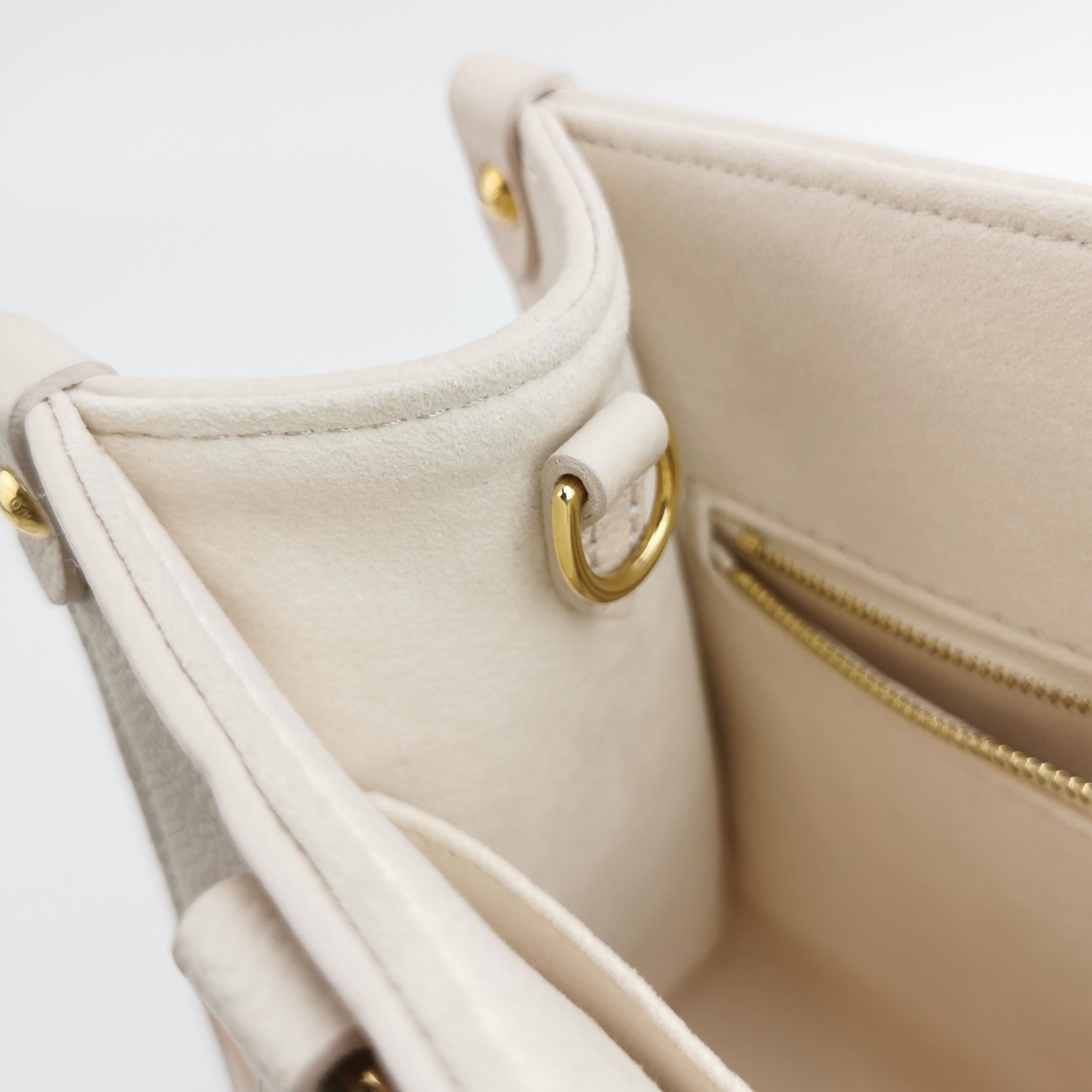 Louis Vuitton(LV) OnTheGo Tote By The Pool Monogram Empreinte Giant PM — photo 9 of 10