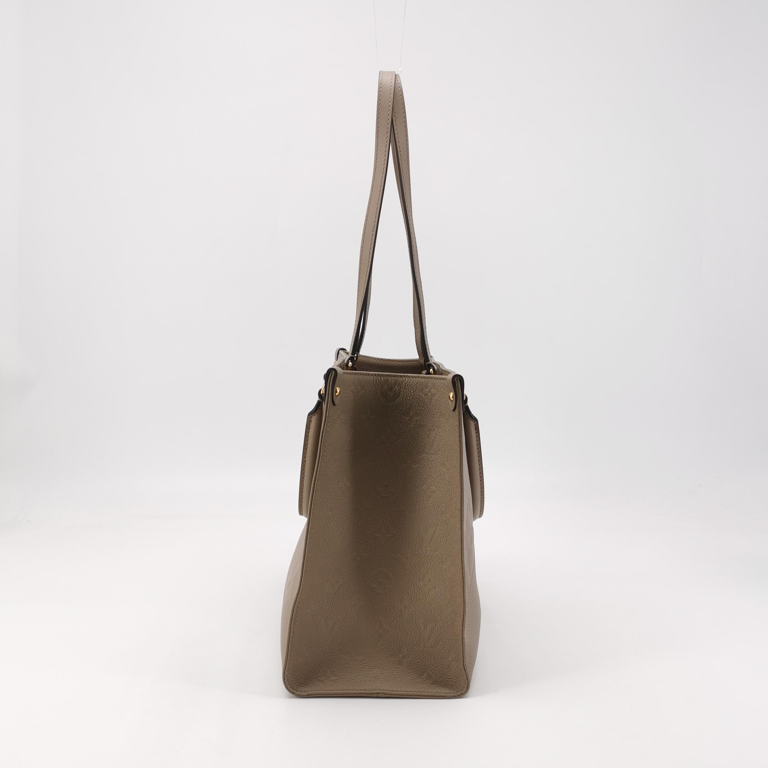 Louis Vuitton(LV) OnTheGo Tote Monogram Empreinte Giant MM — photo 5 of 15