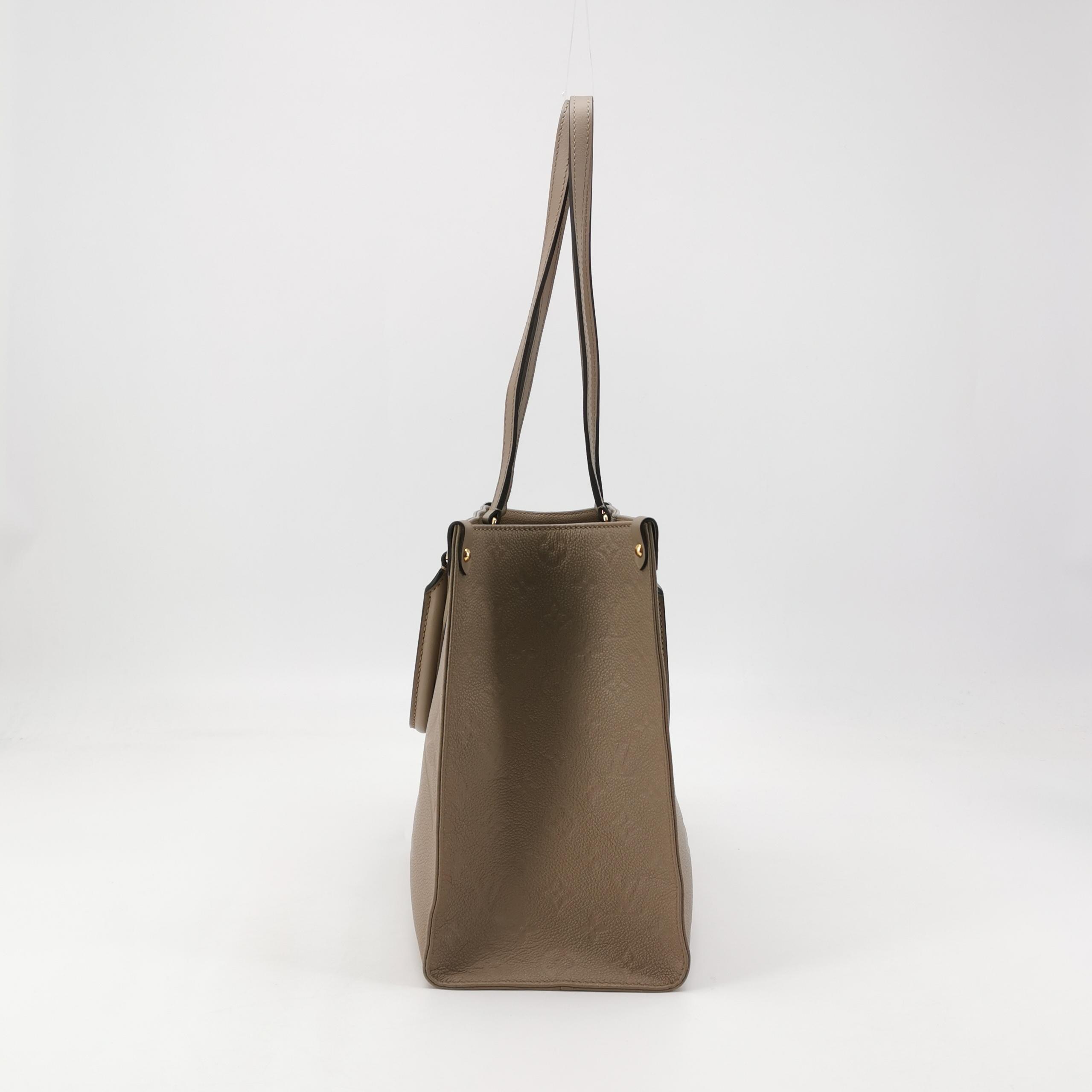 Louis Vuitton(LV) OnTheGo Tote Monogram Empreinte Giant MM — photo 4 of 15