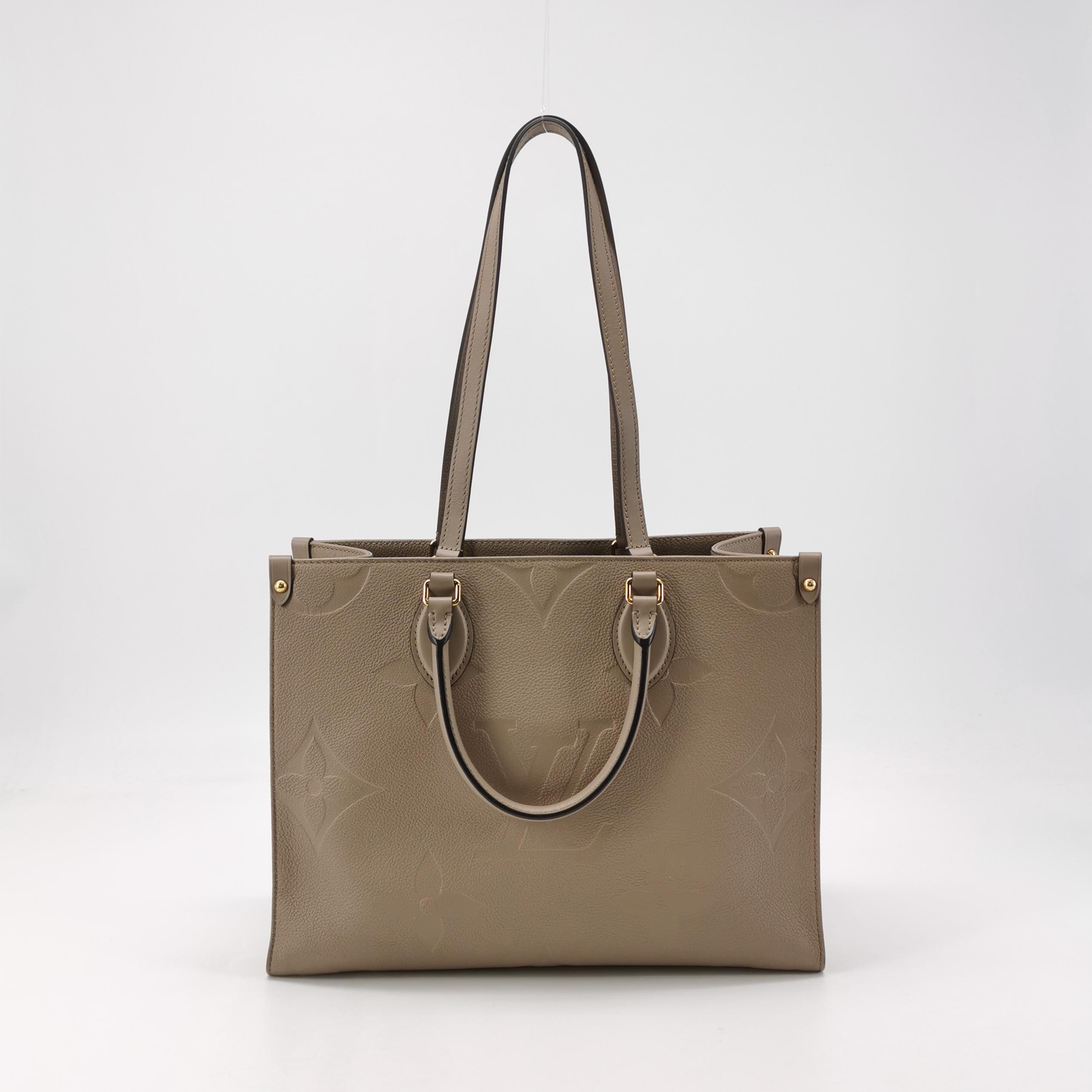 Louis Vuitton(LV) OnTheGo Tote Monogram Empreinte Giant MM — photo 3 of 15