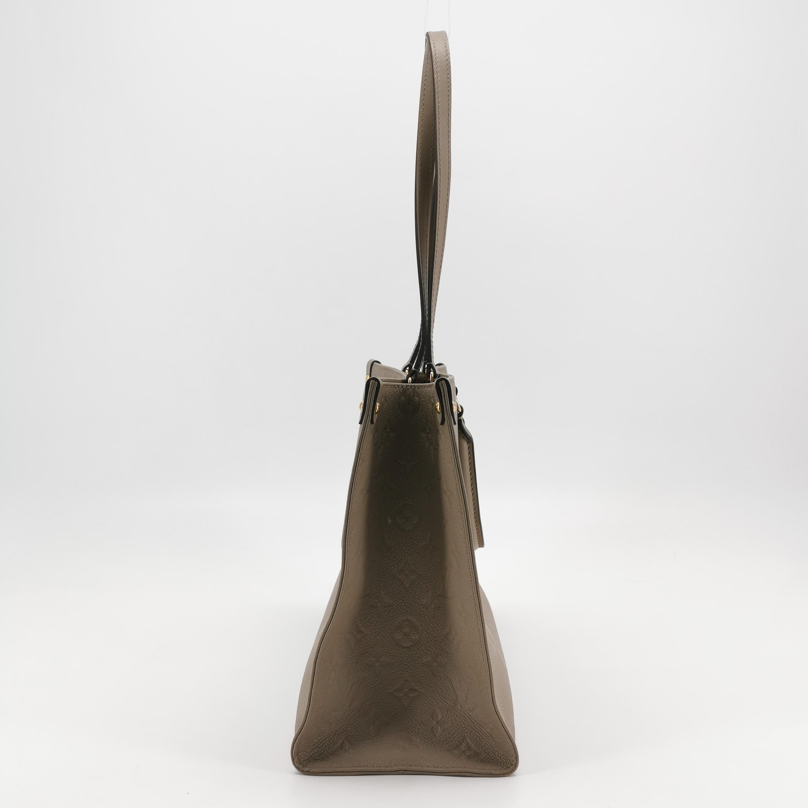 Louis Vuitton(LV) OnTheGo Tote Monogram Empreinte Giant MM — photo 5 of 14
