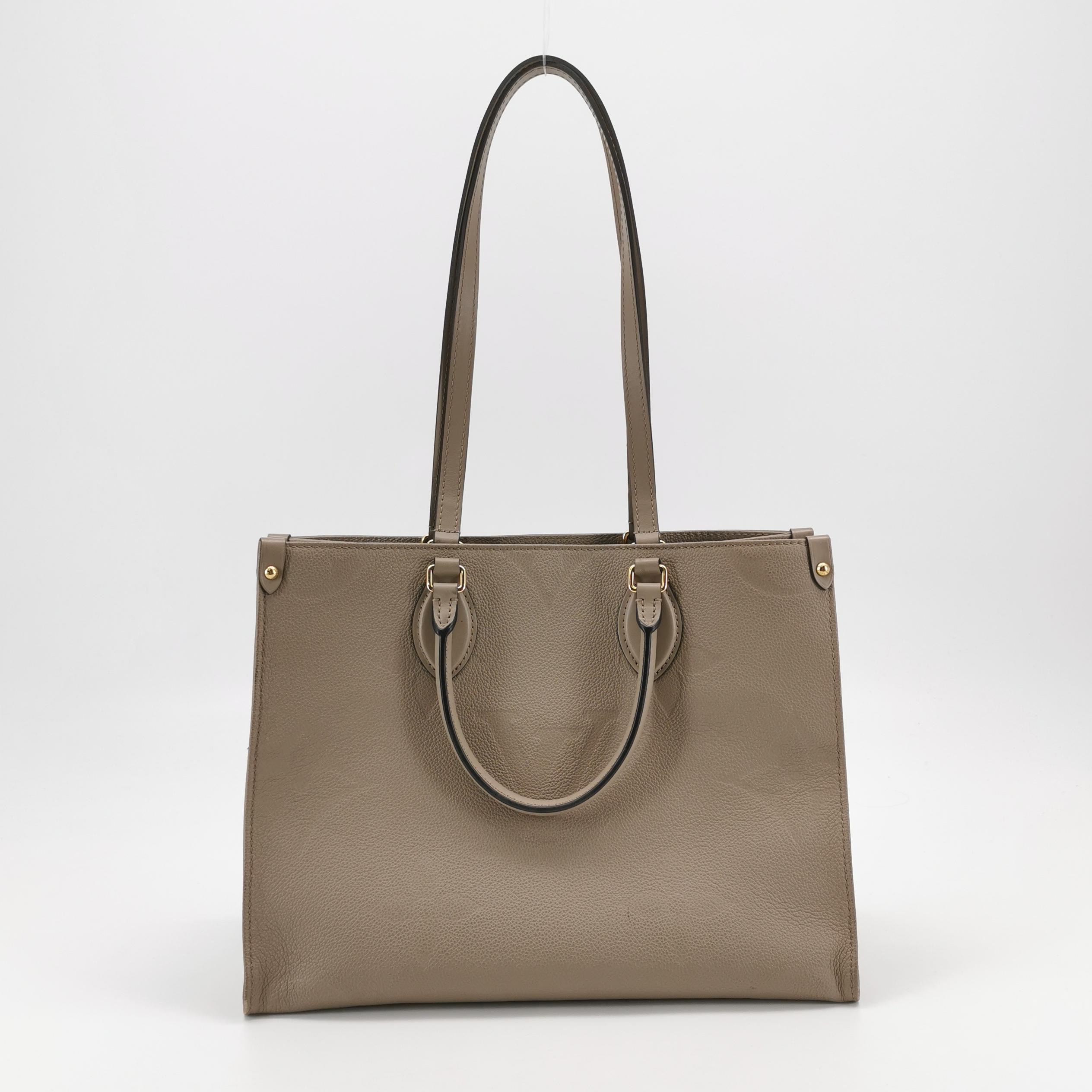 Louis Vuitton(LV) OnTheGo Tote Monogram Empreinte Giant MM — photo 3 of 14