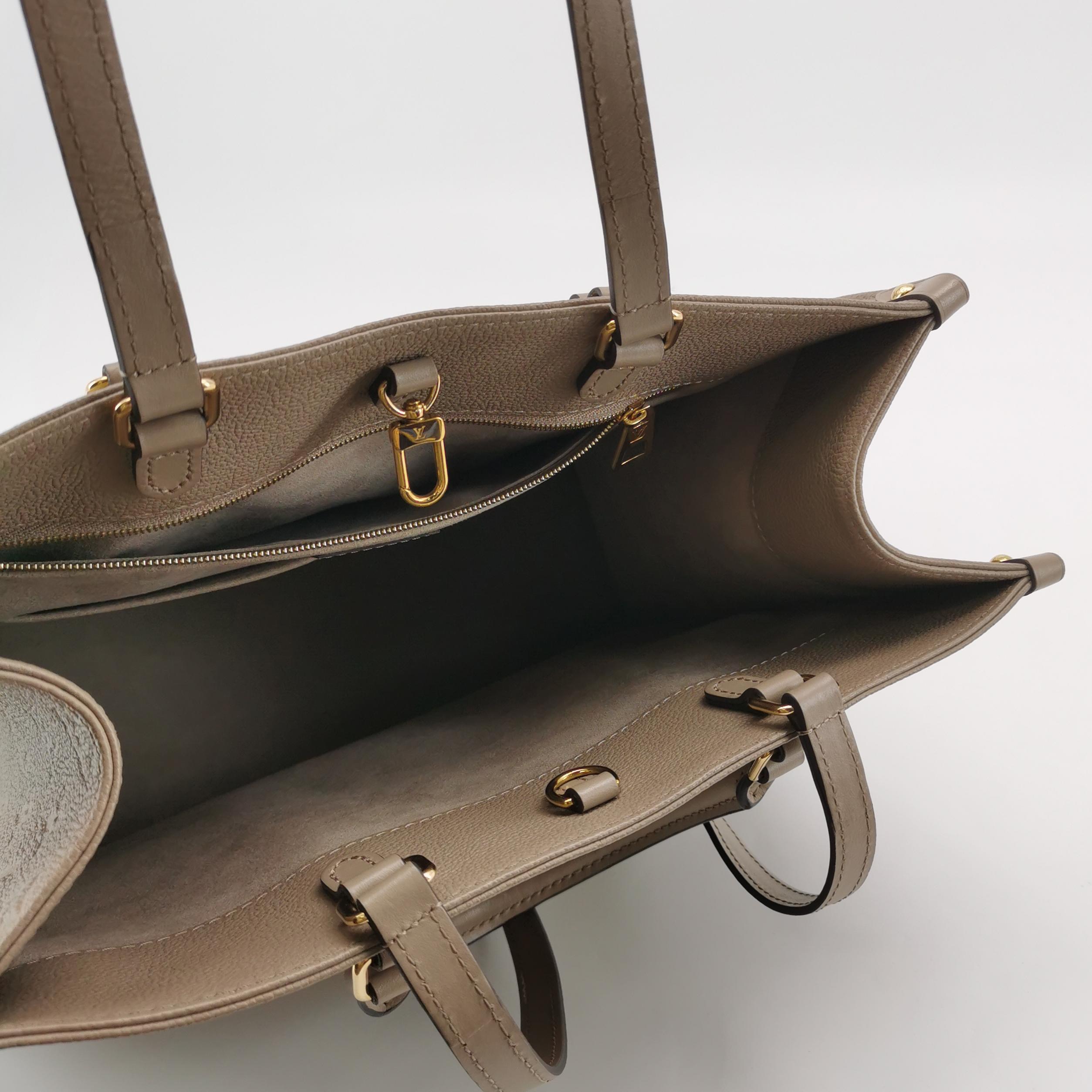 Louis Vuitton(LV) OnTheGo Tote Monogram Empreinte Giant MM — photo 7 of 14