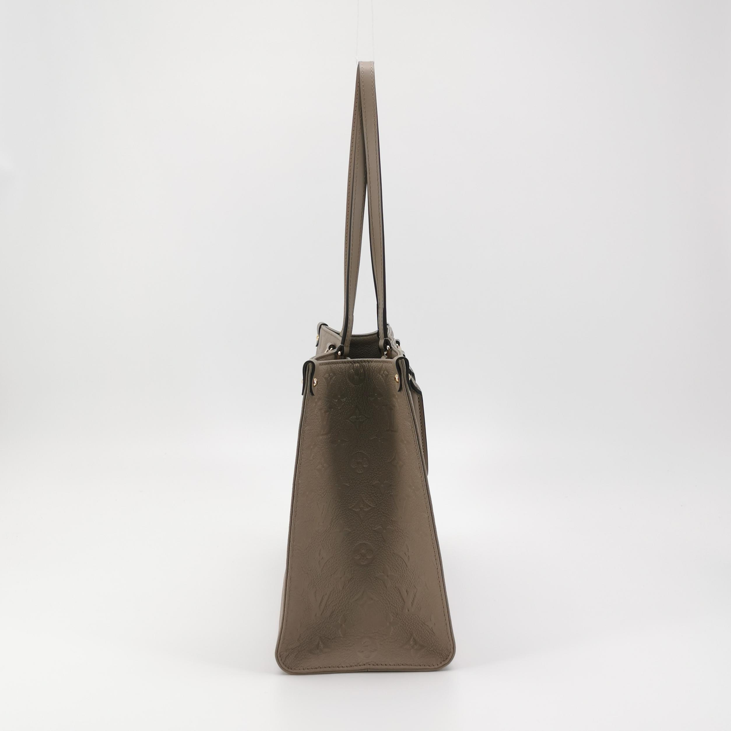 Louis Vuitton(LV) OnTheGo Tote Monogram Empreinte Giant MM — photo 5 of 12
