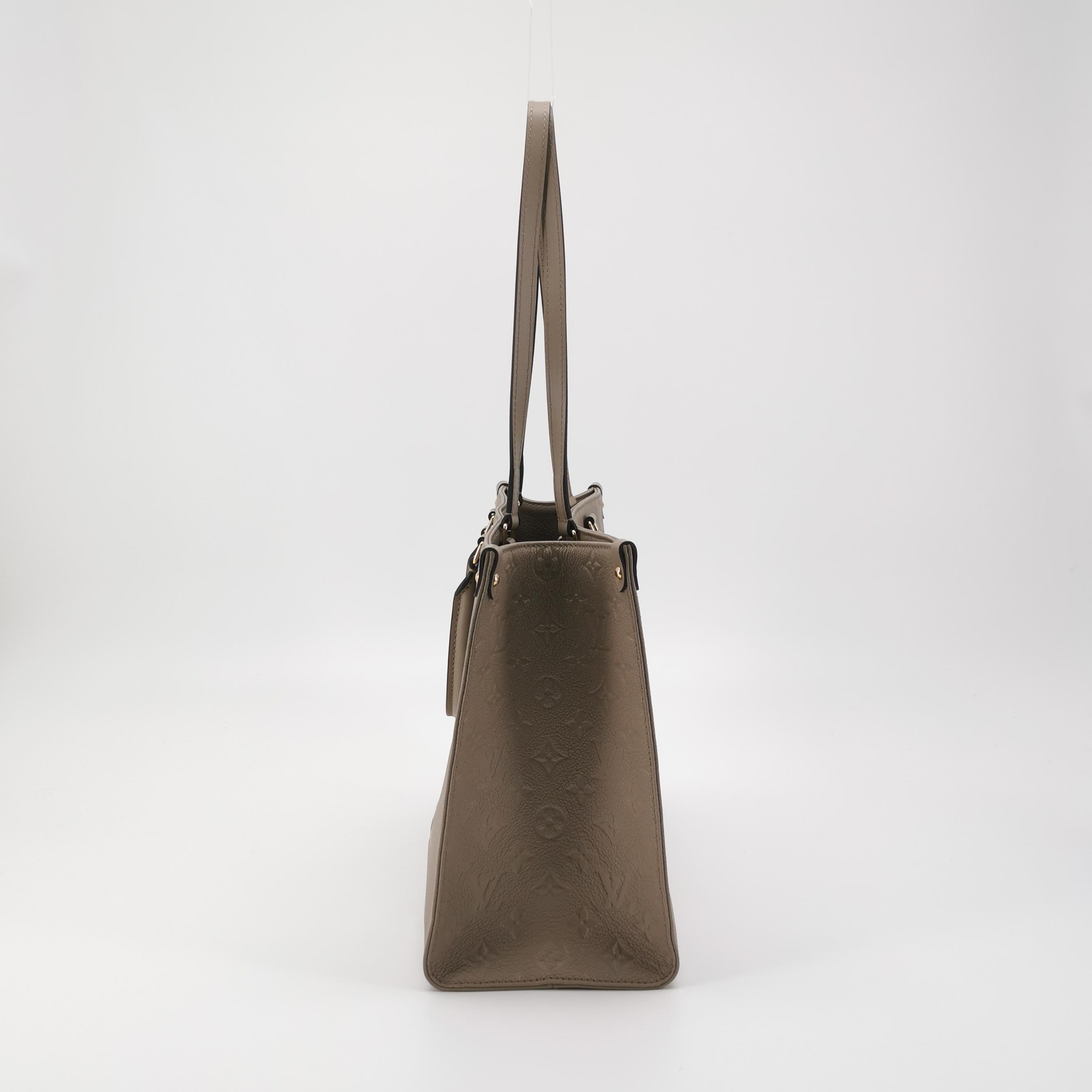Louis Vuitton(LV) OnTheGo Tote Monogram Empreinte Giant MM — photo 4 of 12