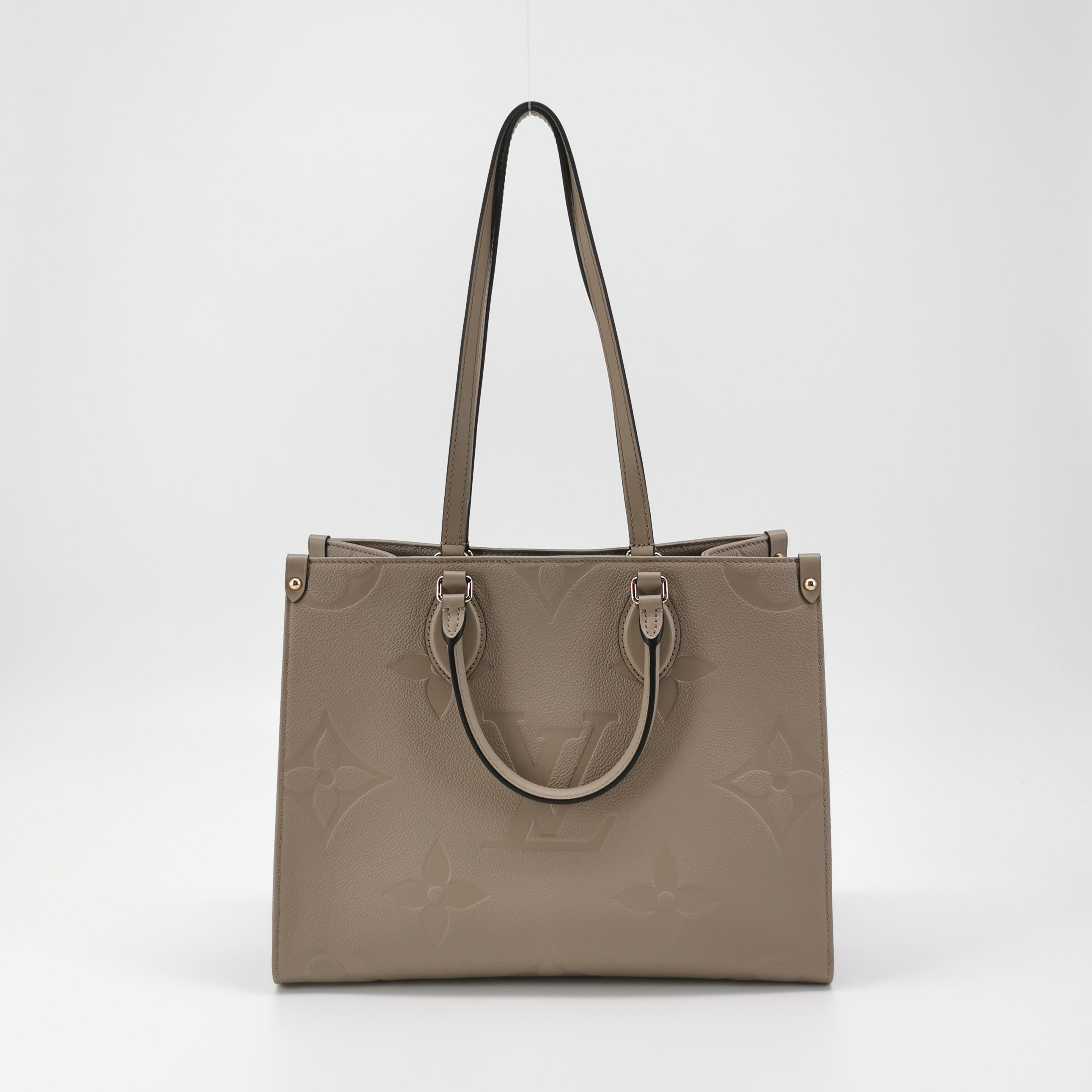 Louis Vuitton(LV) OnTheGo Tote Monogram Empreinte Giant MM — photo 3 of 12