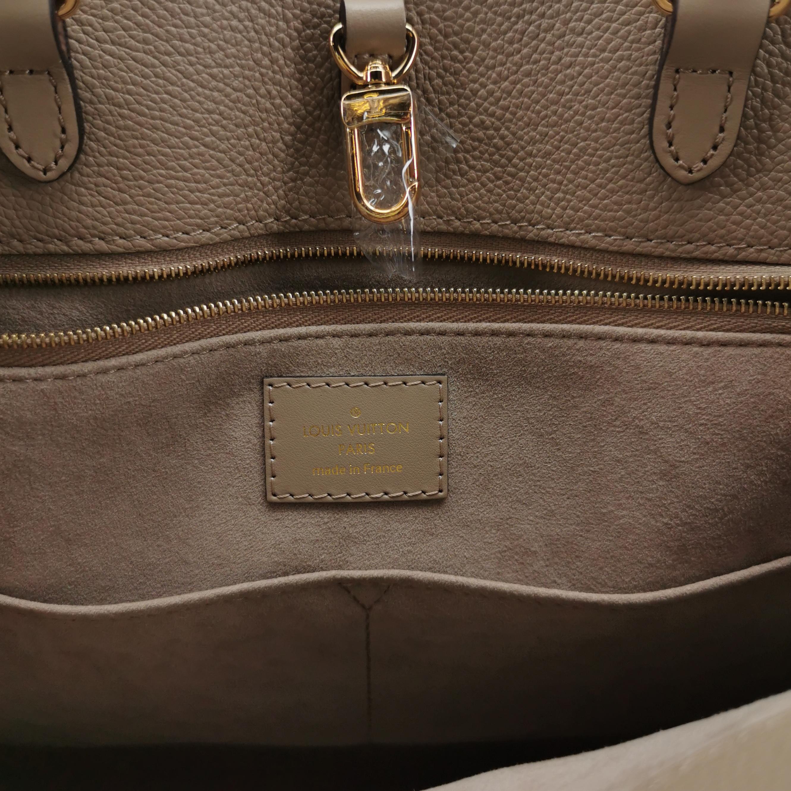 Louis Vuitton(LV) OnTheGo Tote Monogram Empreinte Giant MM — photo 8 of 12