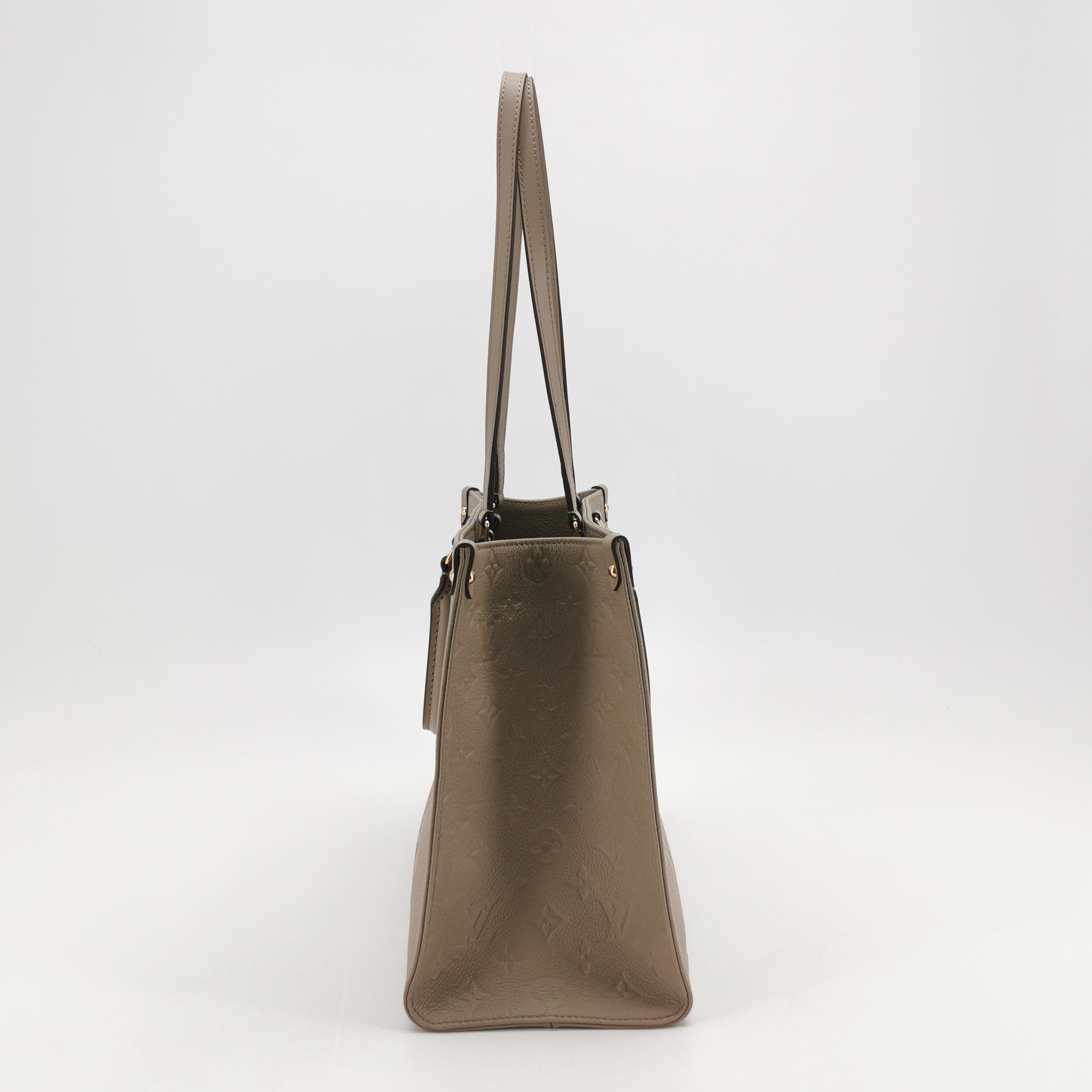 Louis Vuitton(LV) OnTheGo Tote Monogram Empreinte Giant MM — photo 3 of 15
