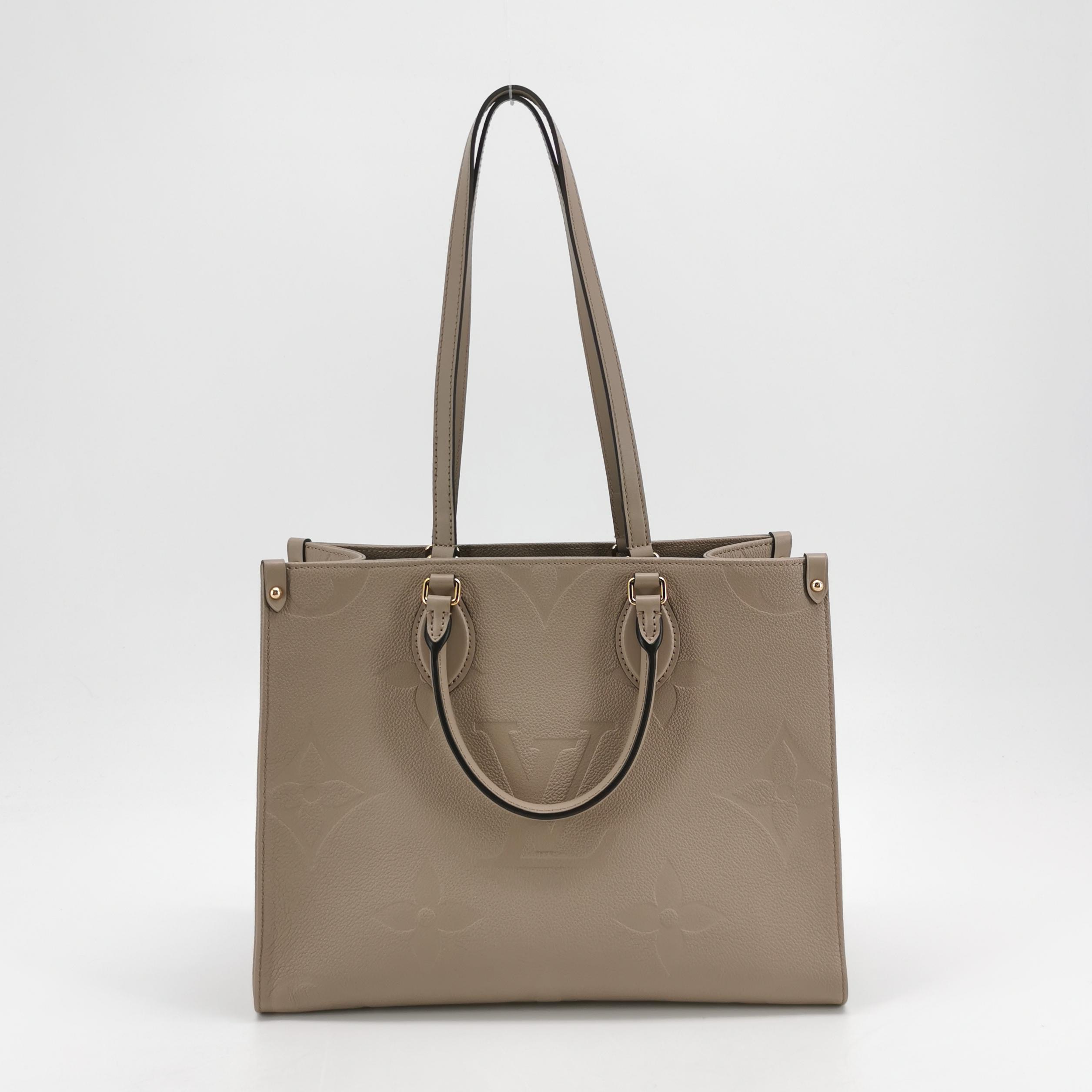 Louis Vuitton(LV) OnTheGo Tote Monogram Empreinte Giant MM — photo 5 of 15