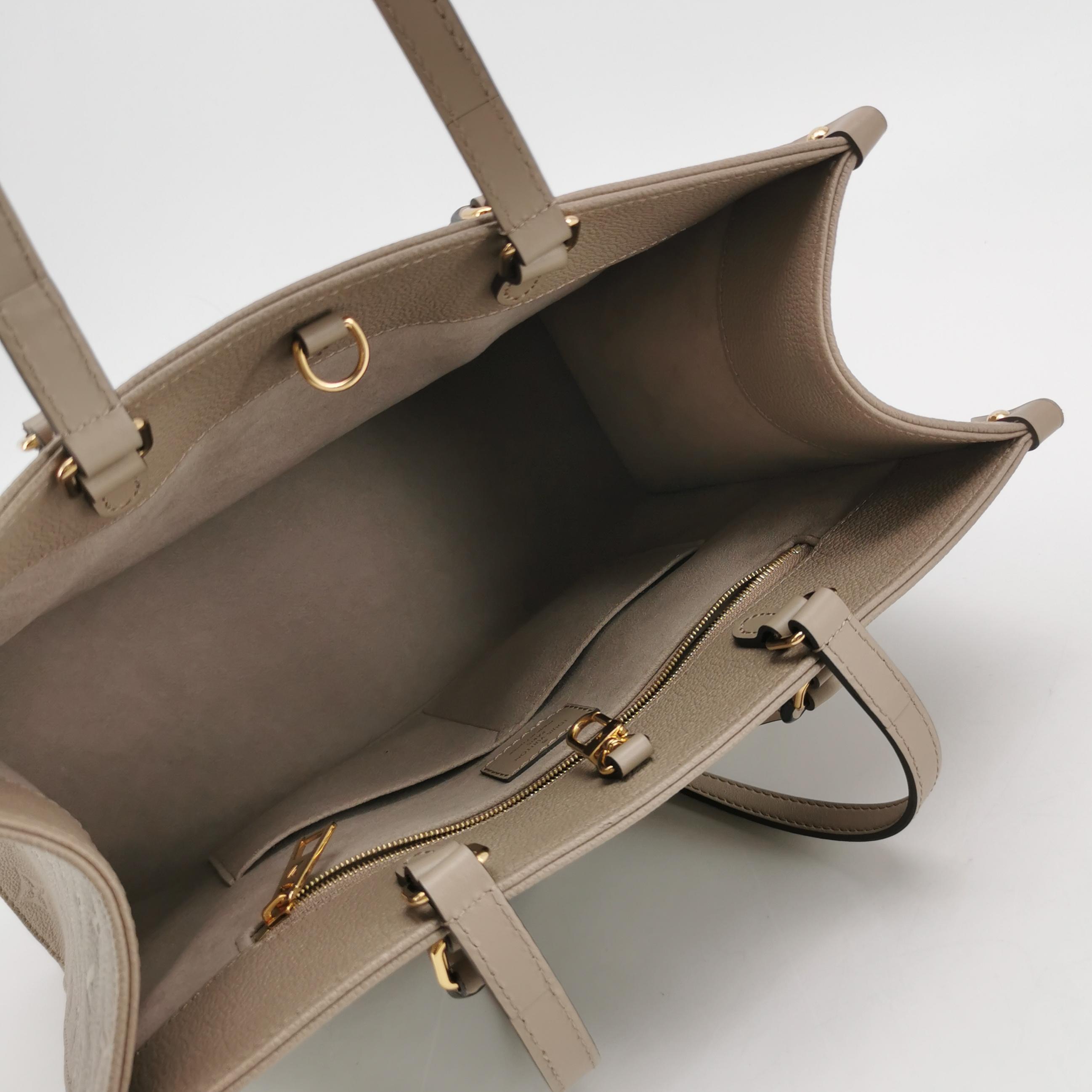 Louis Vuitton(LV) OnTheGo Tote Monogram Empreinte Giant MM — photo 7 of 15