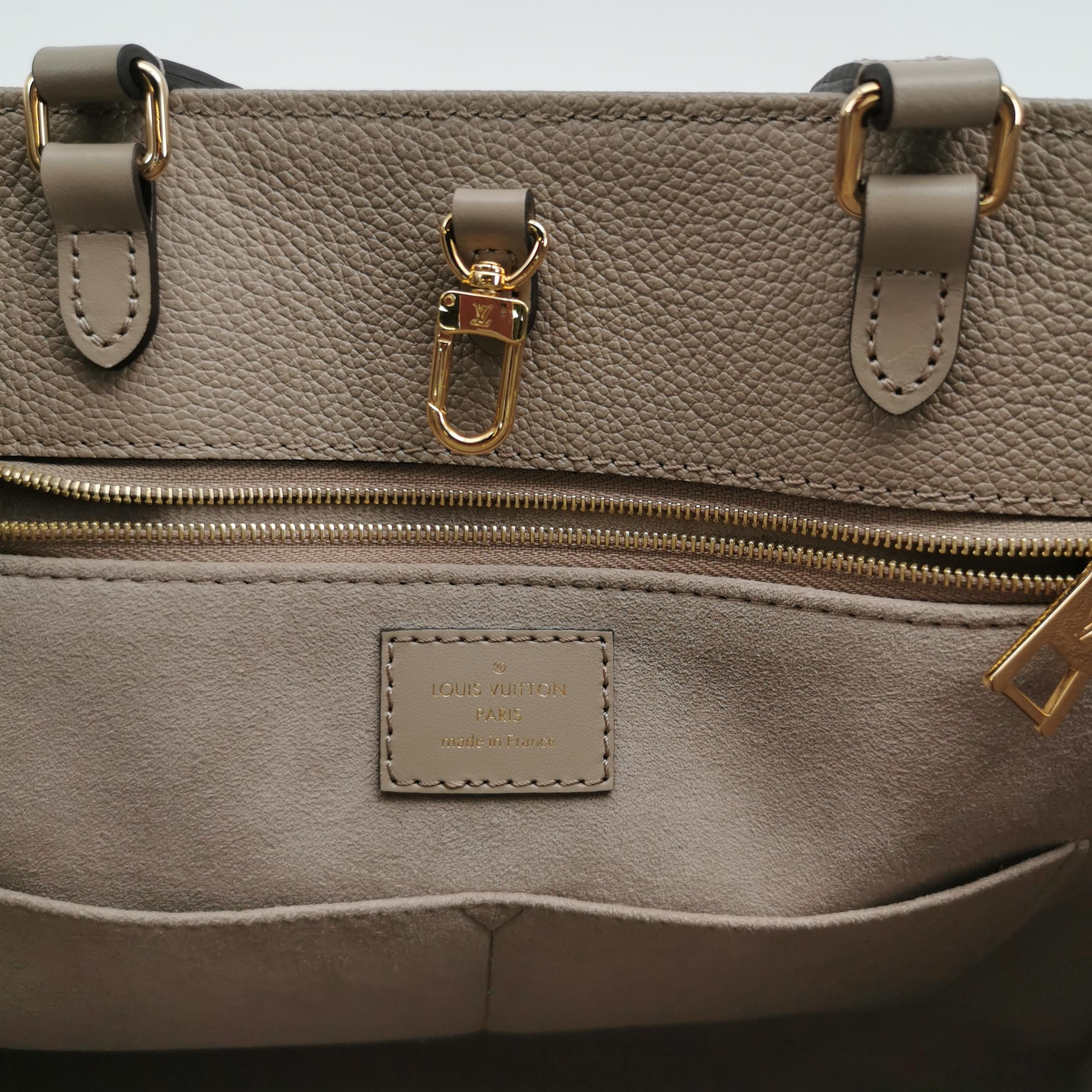 Louis Vuitton(LV) OnTheGo Tote Monogram Empreinte Giant MM — photo 8 of 15