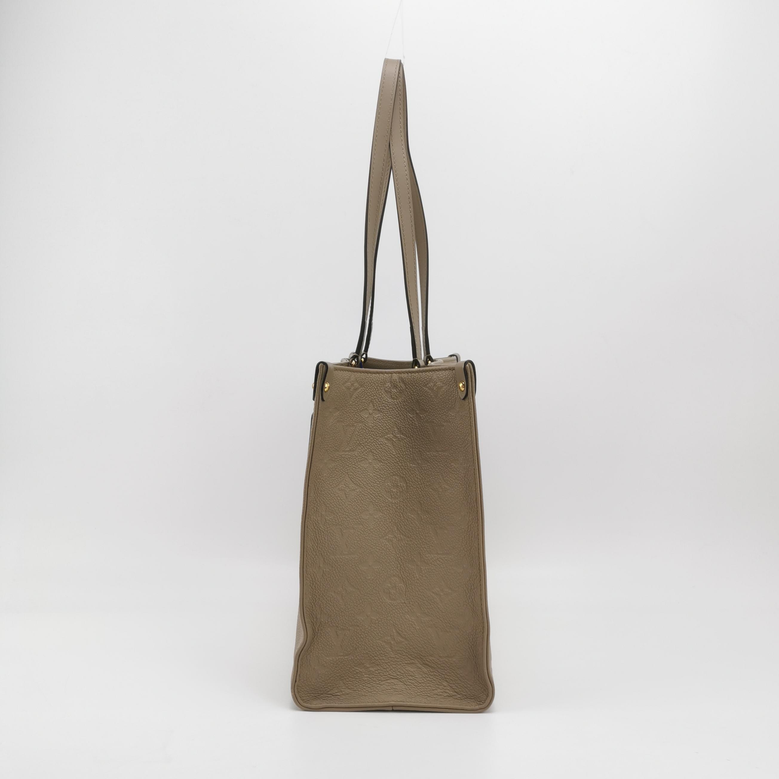 Louis Vuitton(LV) OnTheGo Tote Monogram Empreinte Giant MM — photo 4 of 13