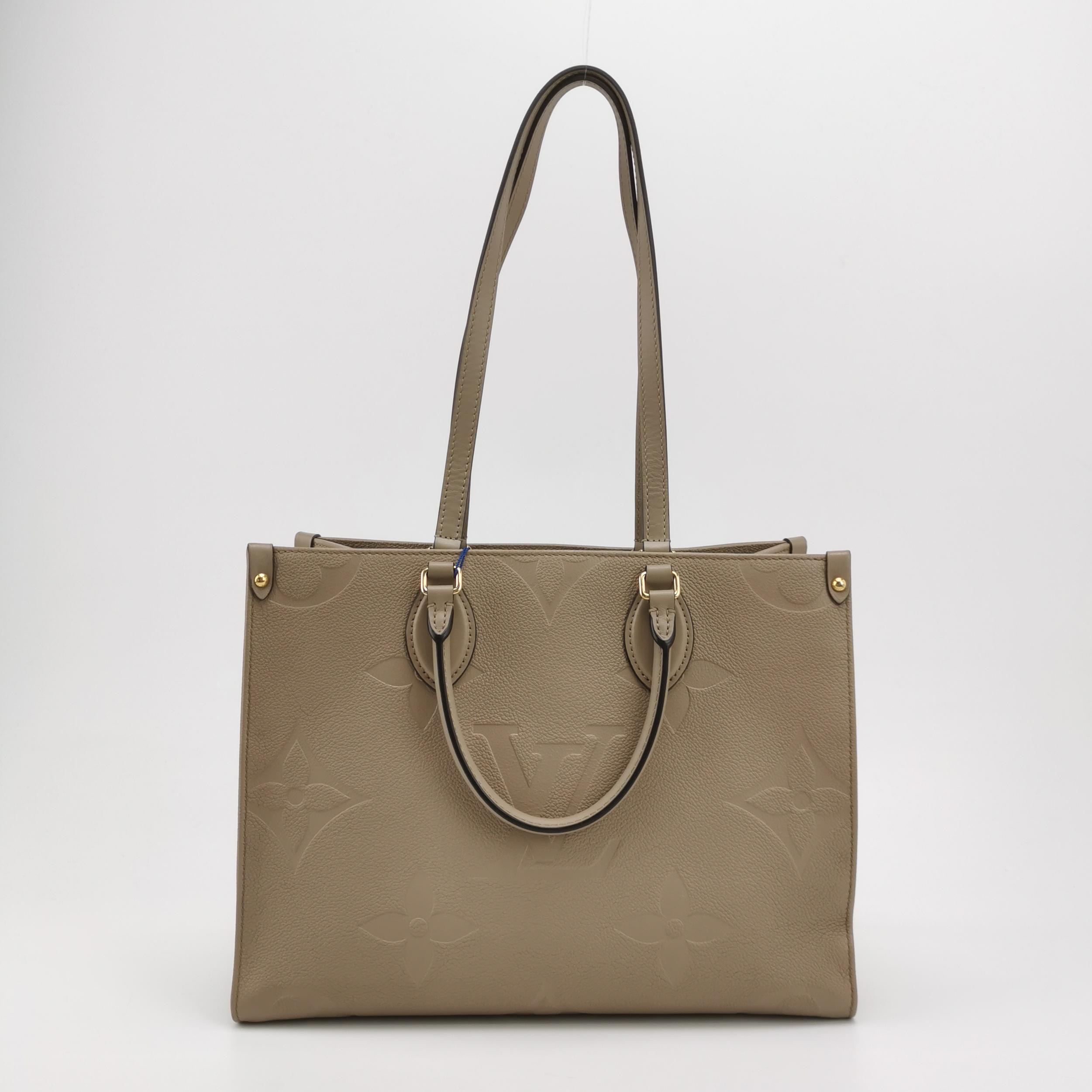 Louis Vuitton(LV) OnTheGo Tote Monogram Empreinte Giant MM — photo 3 of 13