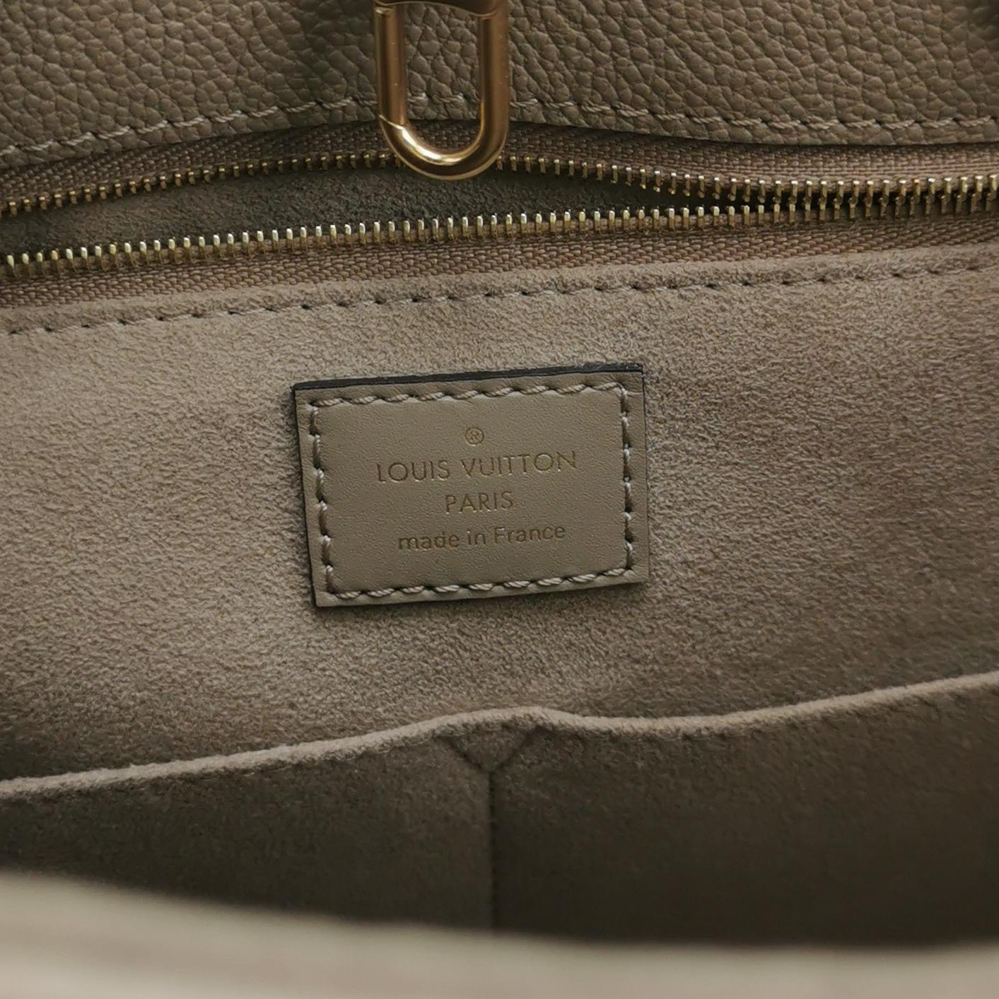 Louis Vuitton(LV) OnTheGo Tote Monogram Empreinte Giant MM — photo 7 of 13