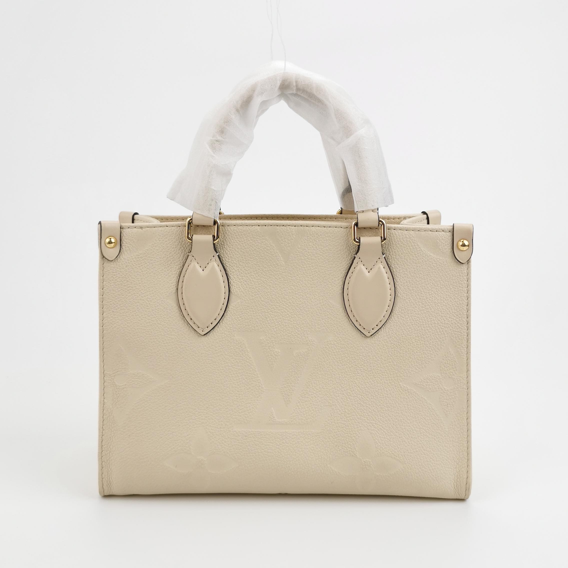 Louis Vuitton(LV) OnTheGo Tote Monogram Empreinte Giant PM — photo 3 of 15